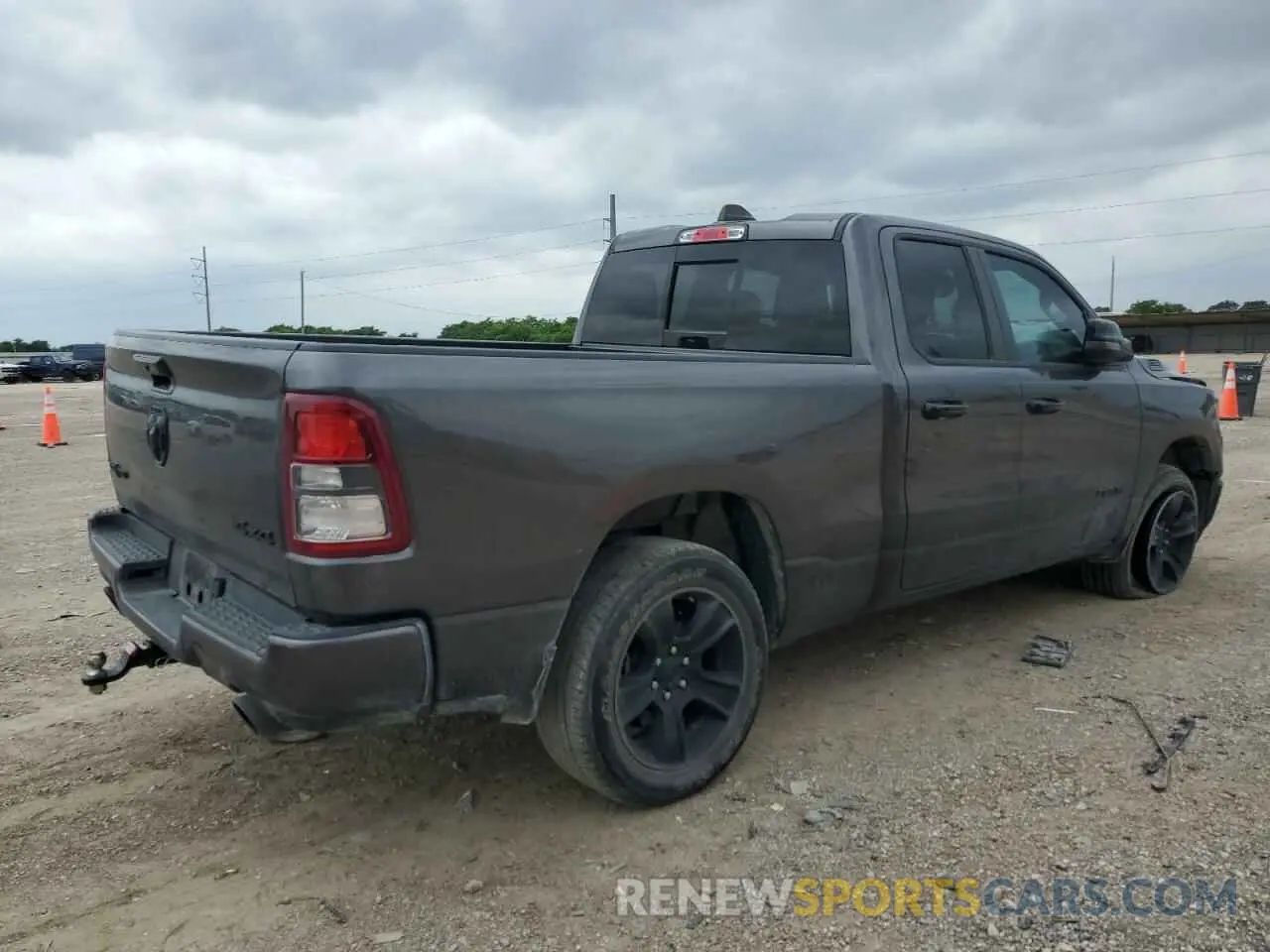 3 Photograph of a damaged car 1C6SRFBT4PN557989 RAM 1500 2023