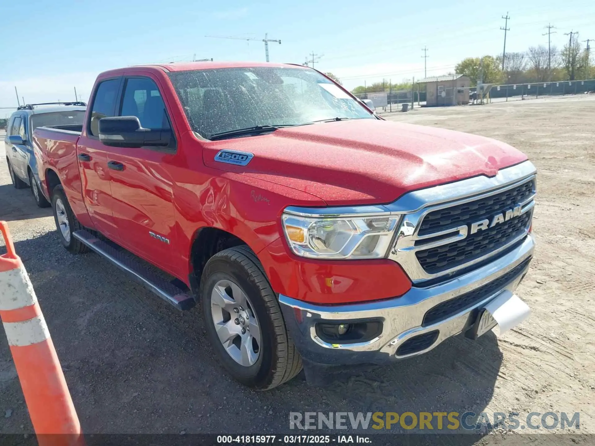 1 Photograph of a damaged car 1C6SRFBTXPN546270 RAM 1500 2023