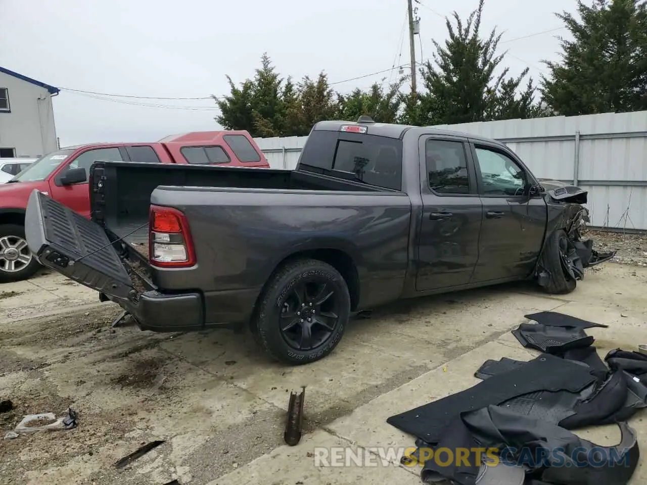 3 Photograph of a damaged car 1C6SRFBTXPN612199 RAM 1500 2023
