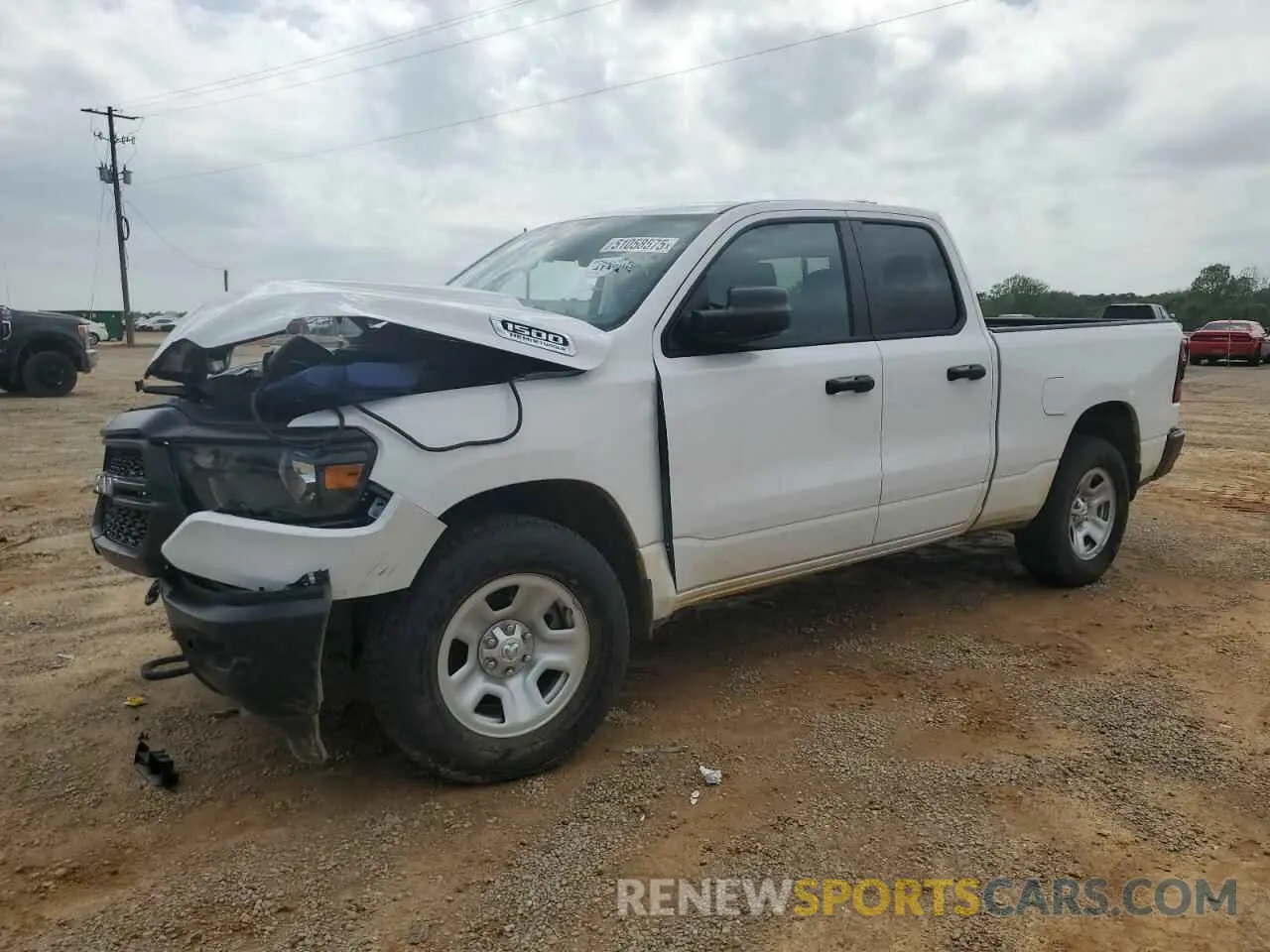 1 Photograph of a damaged car 1C6SRFCT2PN566883 RAM 1500 2023