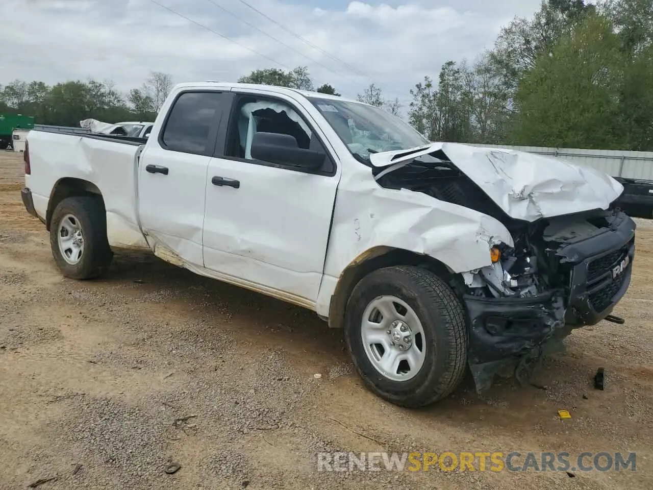 4 Photograph of a damaged car 1C6SRFCT2PN566883 RAM 1500 2023