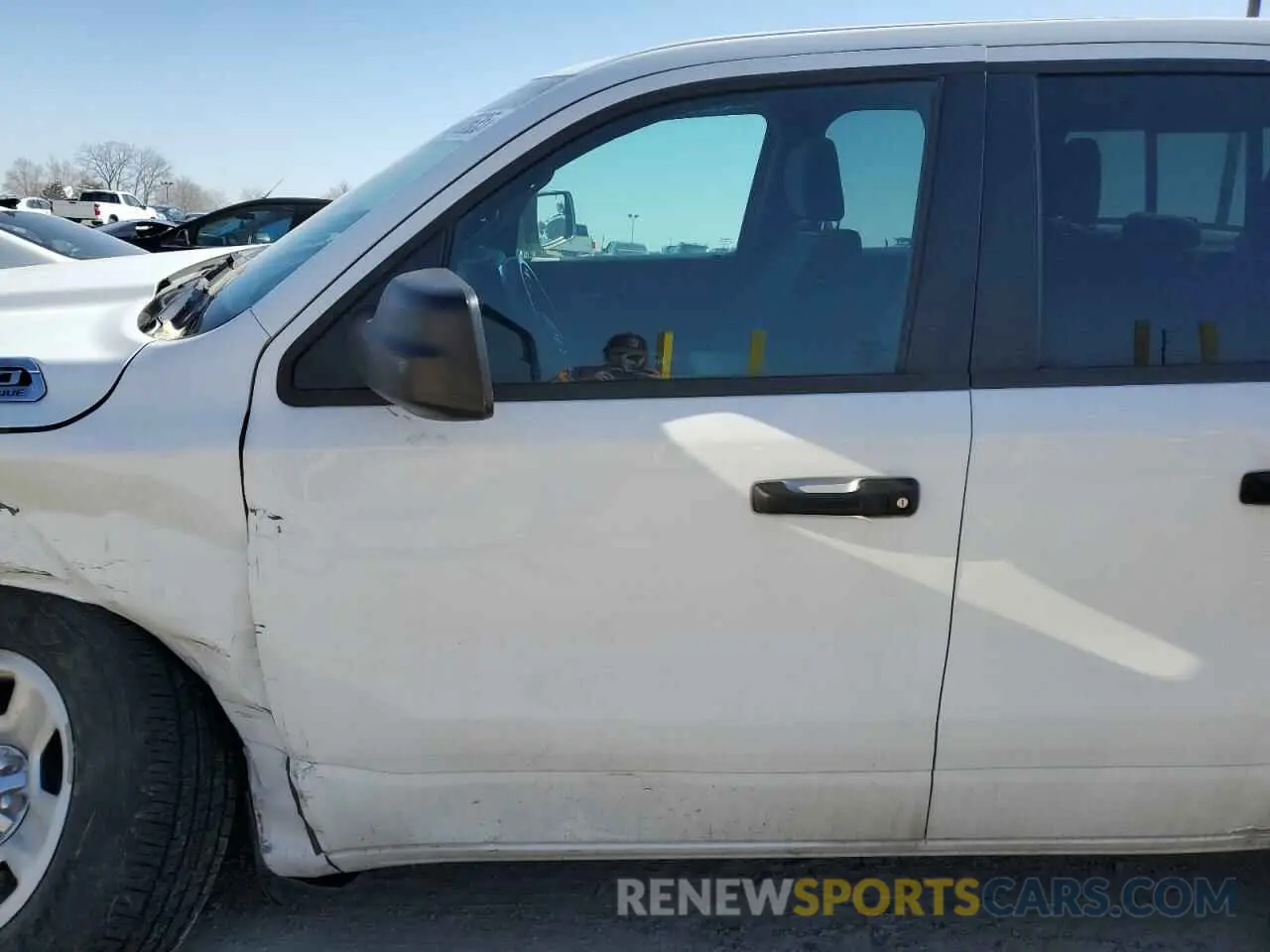 7 Photograph of a damaged car 1C6SRFCT5PN677234 RAM 1500 2023