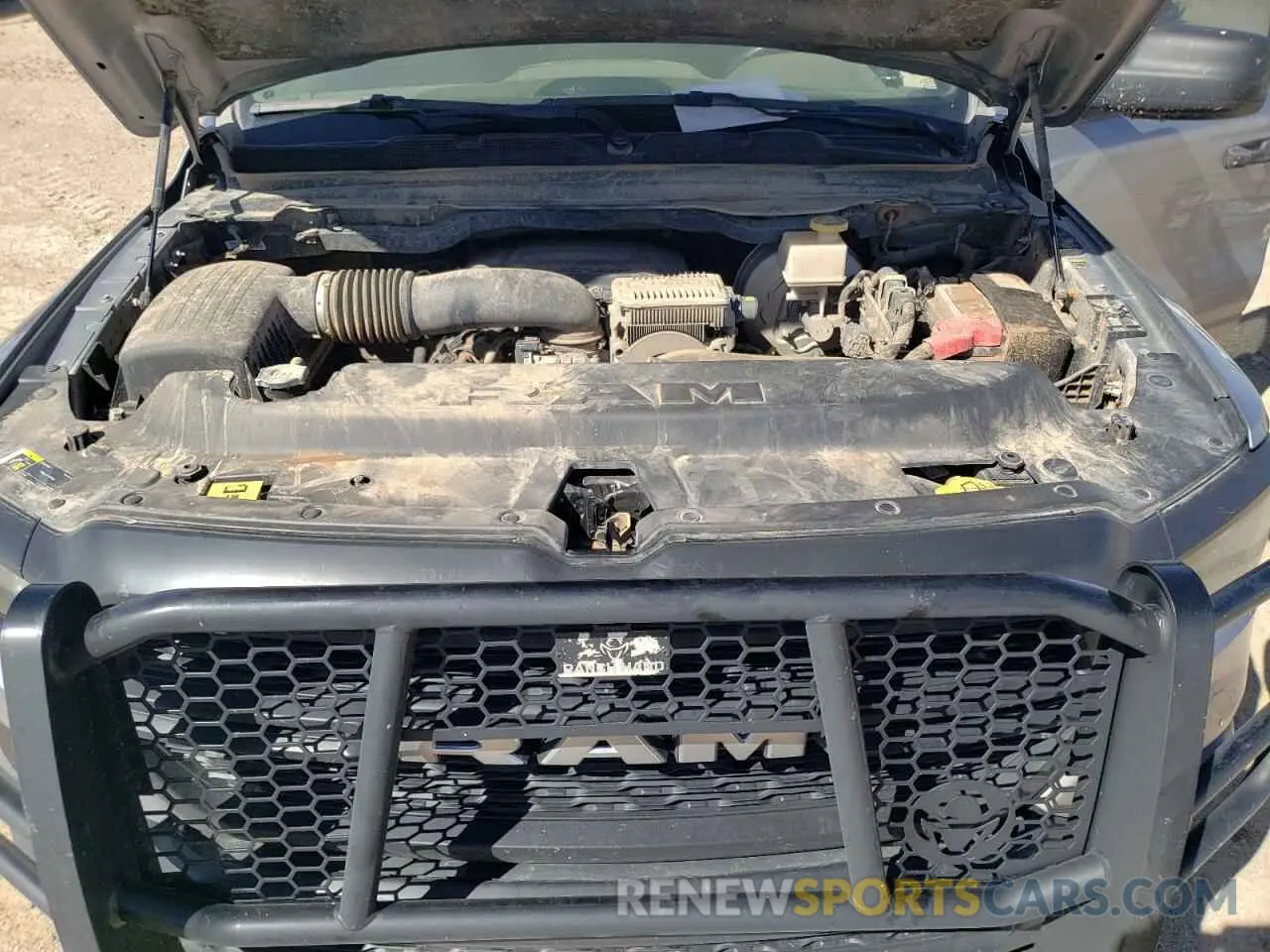 13 Photograph of a damaged car 1C6SRFCT8PN586345 RAM 1500 2023