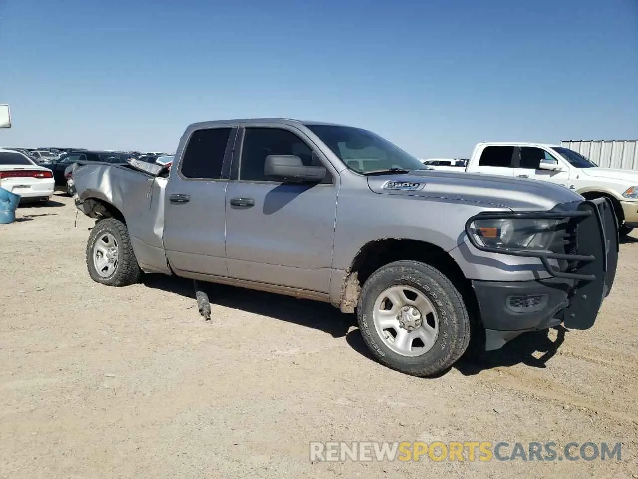 4 Photograph of a damaged car 1C6SRFCT8PN586345 RAM 1500 2023