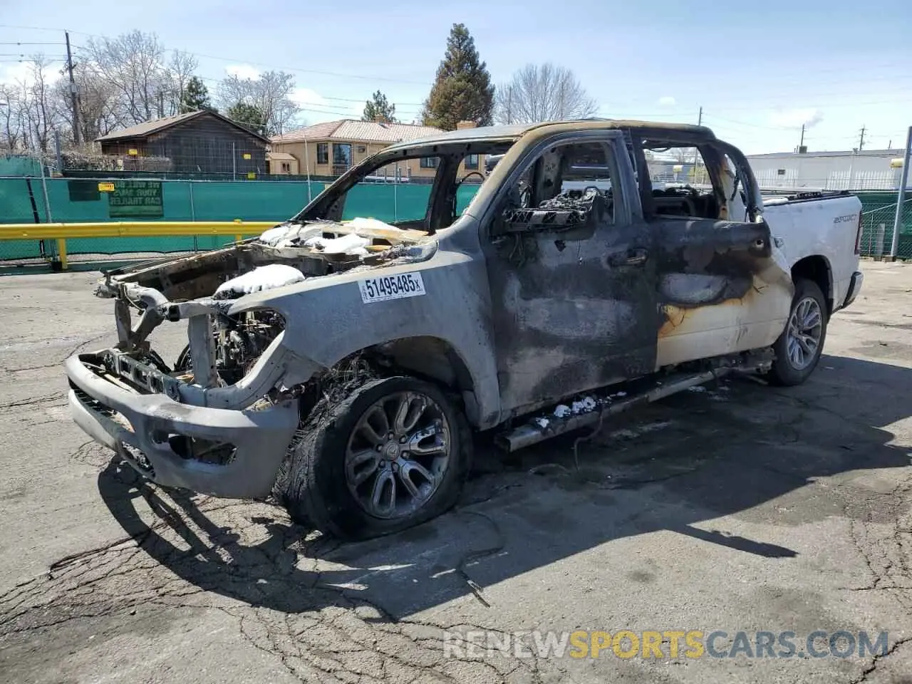 1 Photograph of a damaged car 1C6SRFFM0PN552050 RAM 1500 2023
