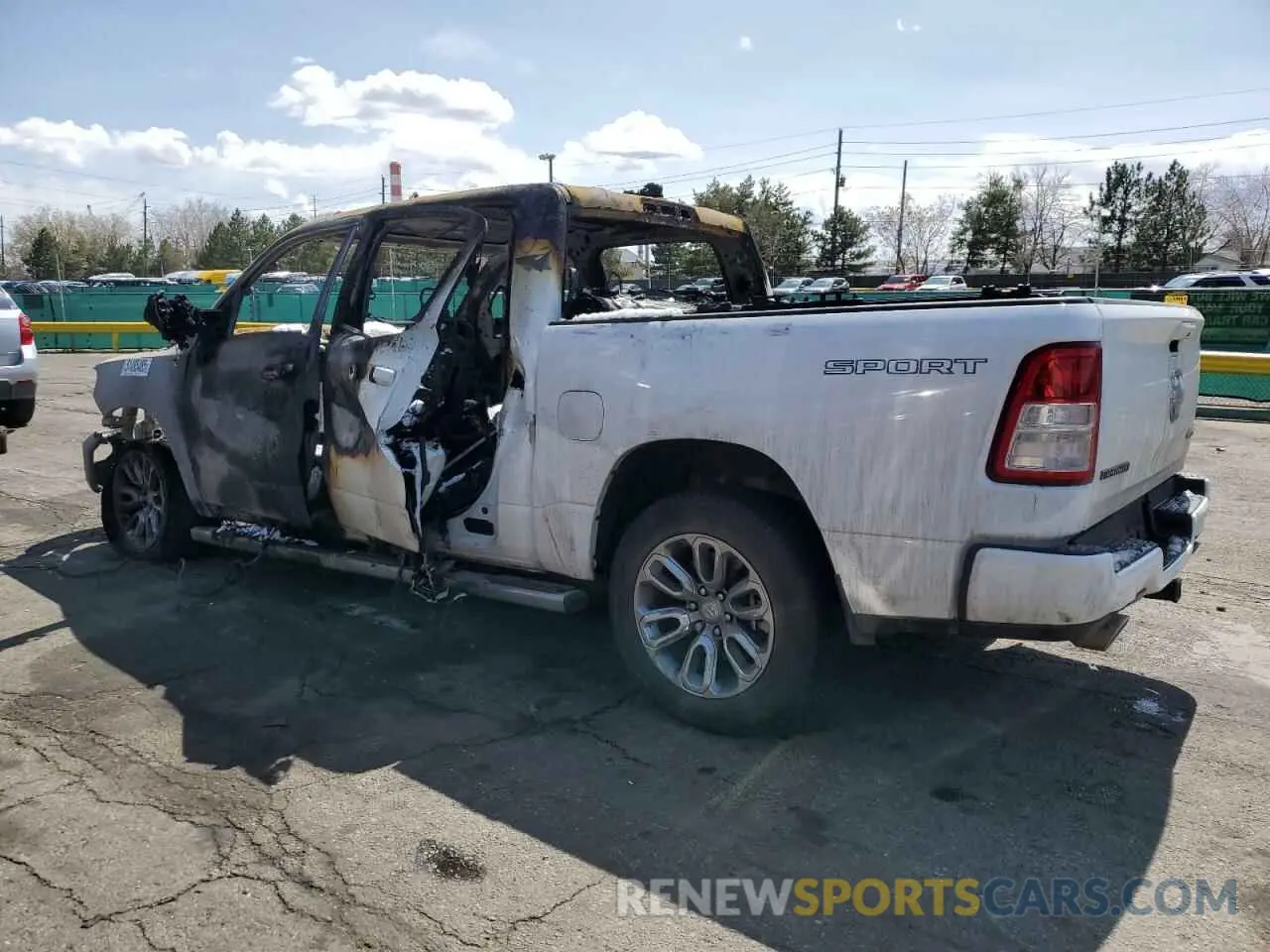 2 Photograph of a damaged car 1C6SRFFM0PN552050 RAM 1500 2023