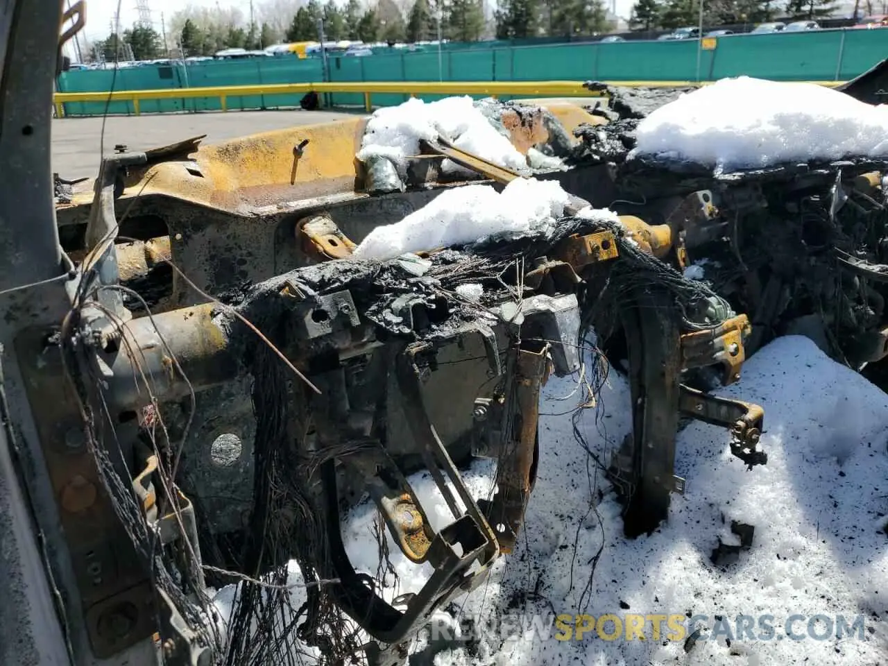 9 Photograph of a damaged car 1C6SRFFM0PN552050 RAM 1500 2023