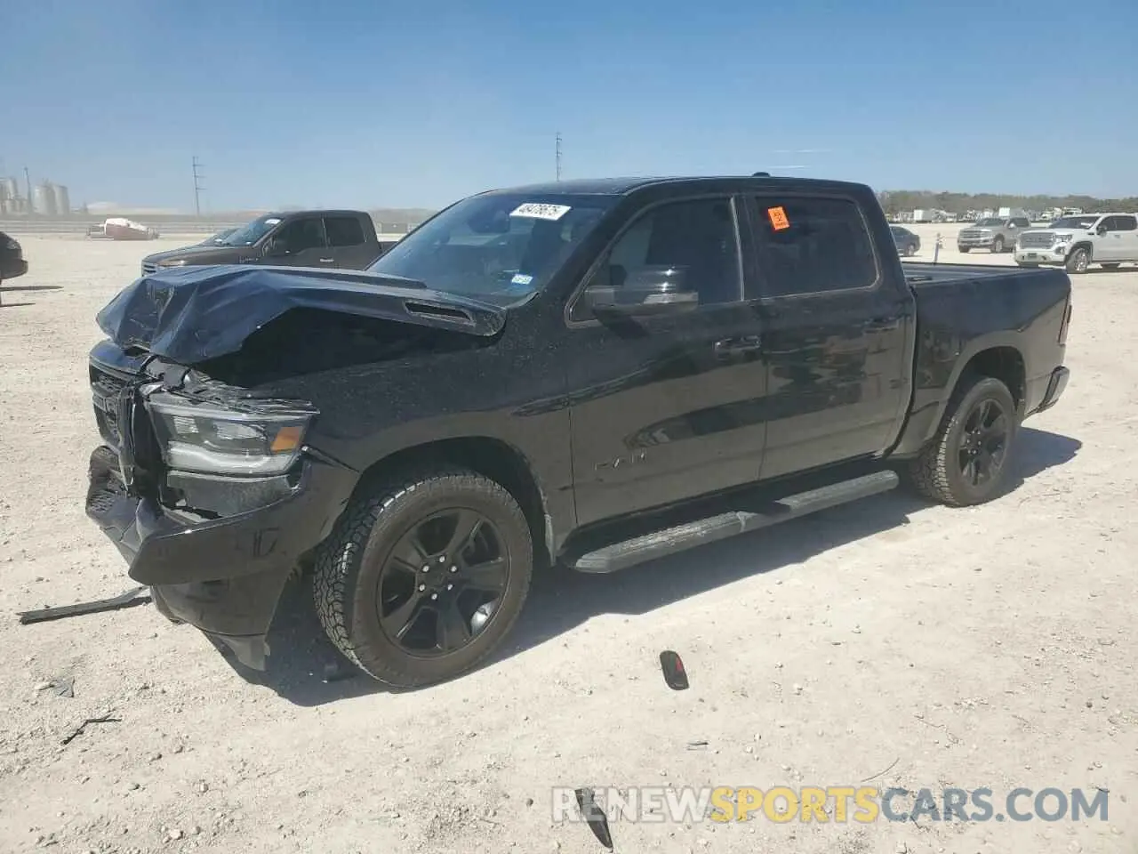 1 Photograph of a damaged car 1C6SRFFM2PN563471 RAM 1500 2023