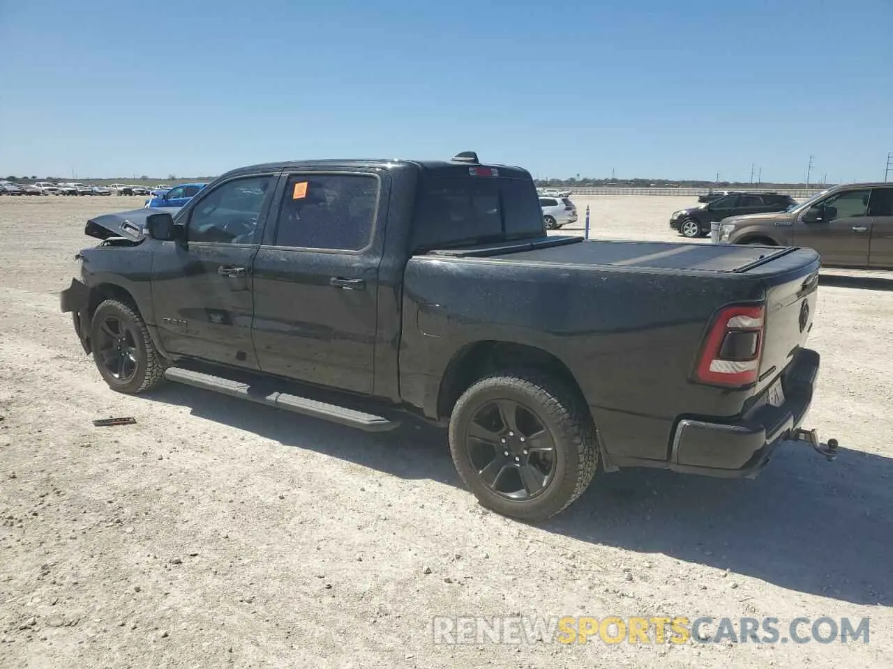 2 Photograph of a damaged car 1C6SRFFM2PN563471 RAM 1500 2023
