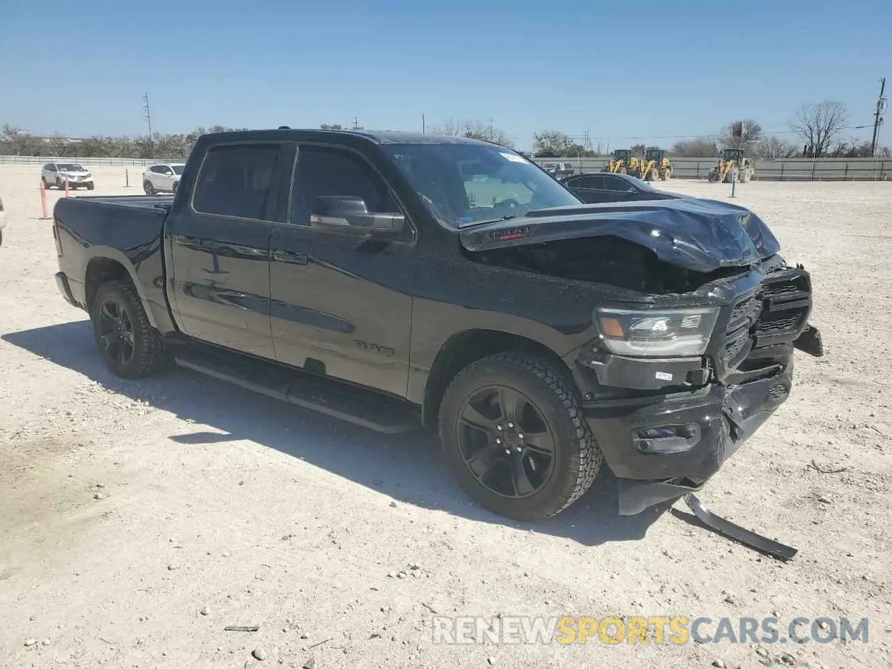 4 Photograph of a damaged car 1C6SRFFM2PN563471 RAM 1500 2023