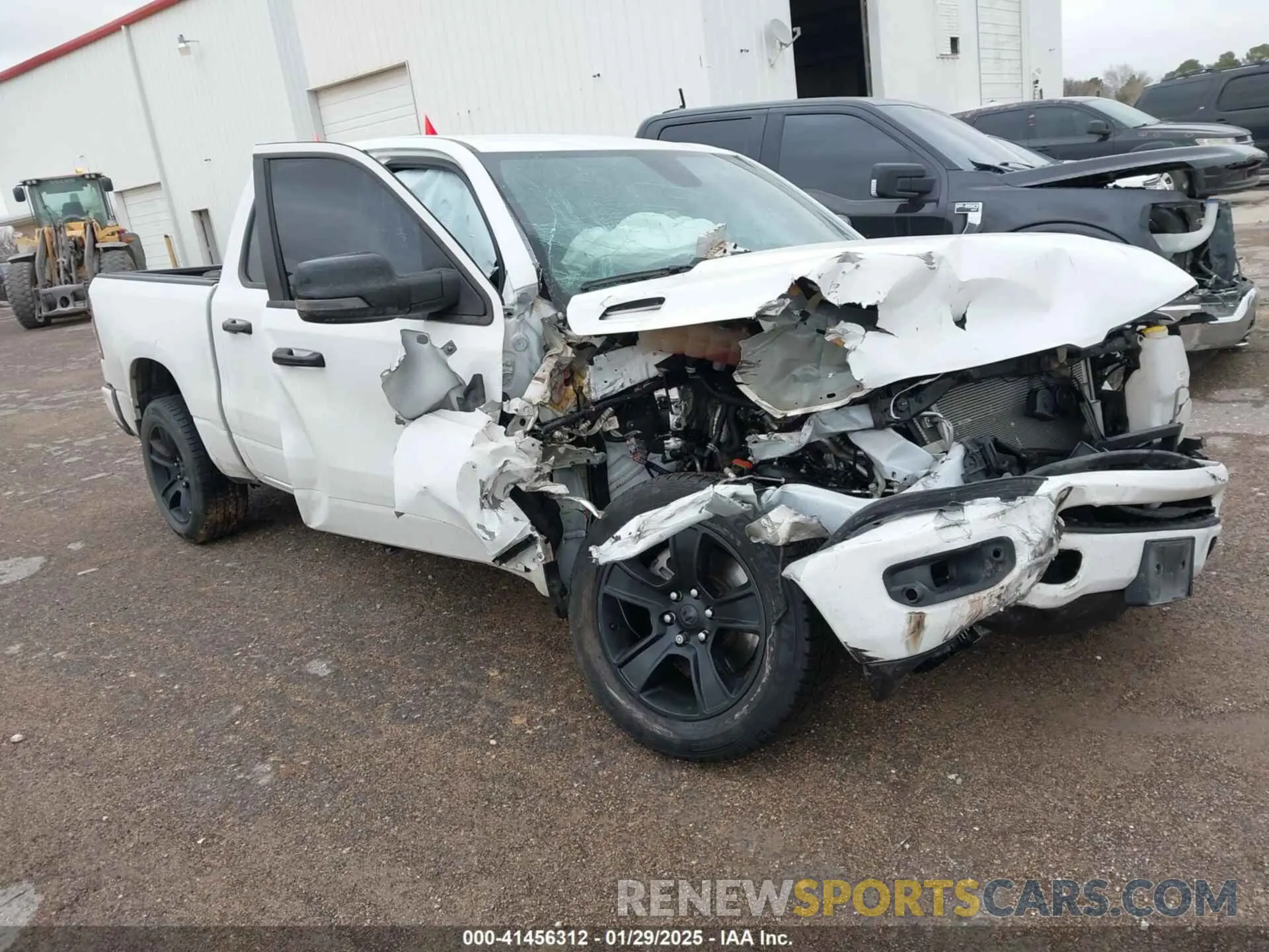 1 Photograph of a damaged car 1C6SRFFM3PN563513 RAM 1500 2023
