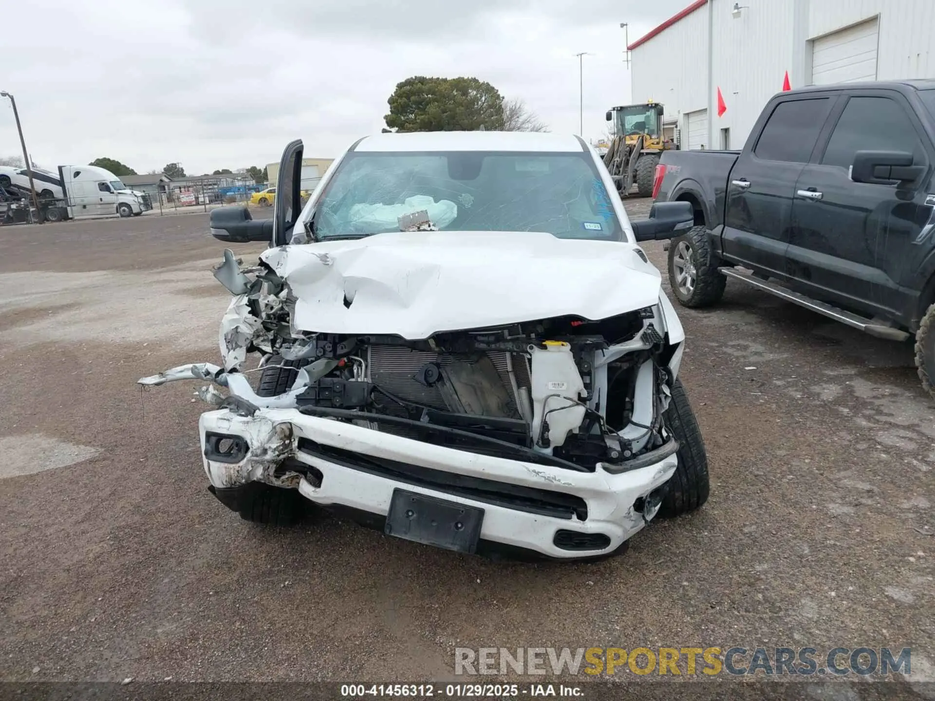 11 Photograph of a damaged car 1C6SRFFM3PN563513 RAM 1500 2023