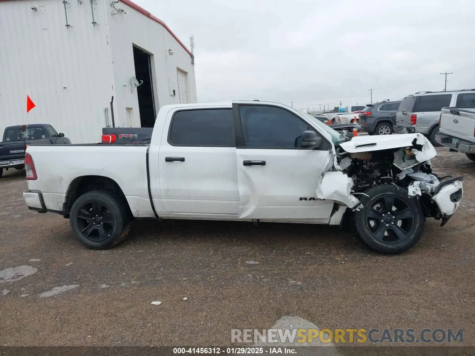 12 Photograph of a damaged car 1C6SRFFM3PN563513 RAM 1500 2023