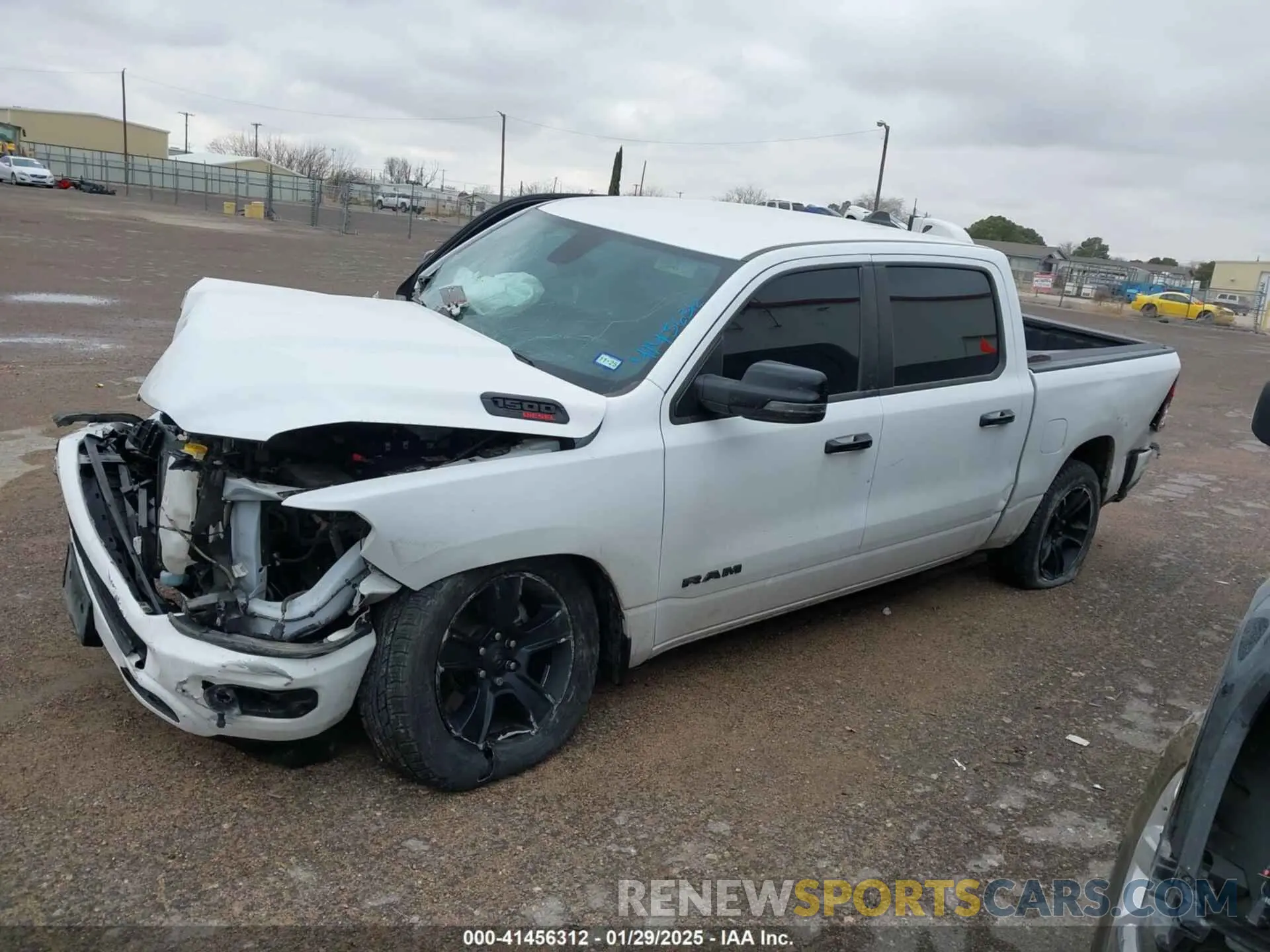13 Photograph of a damaged car 1C6SRFFM3PN563513 RAM 1500 2023