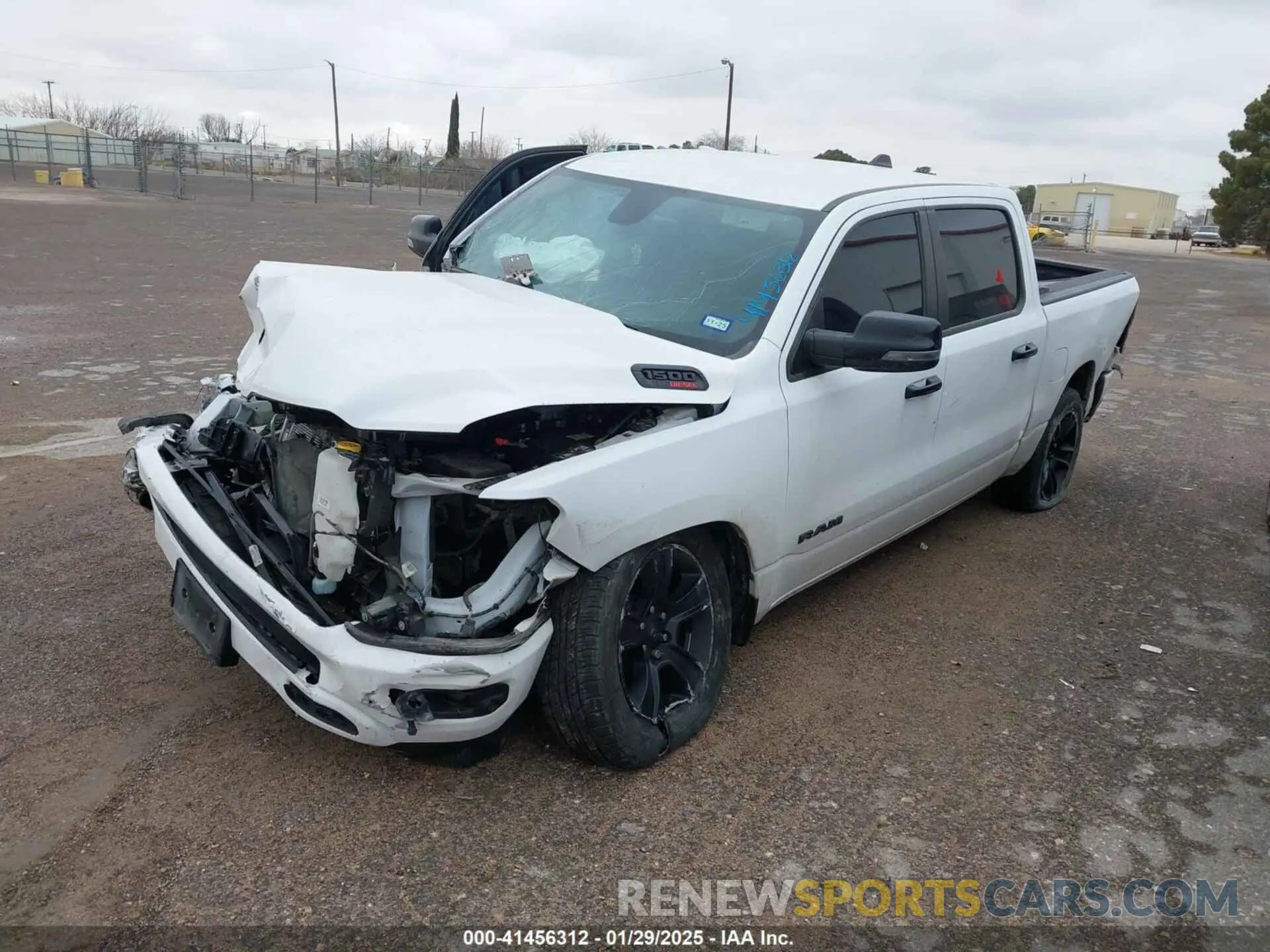 2 Photograph of a damaged car 1C6SRFFM3PN563513 RAM 1500 2023