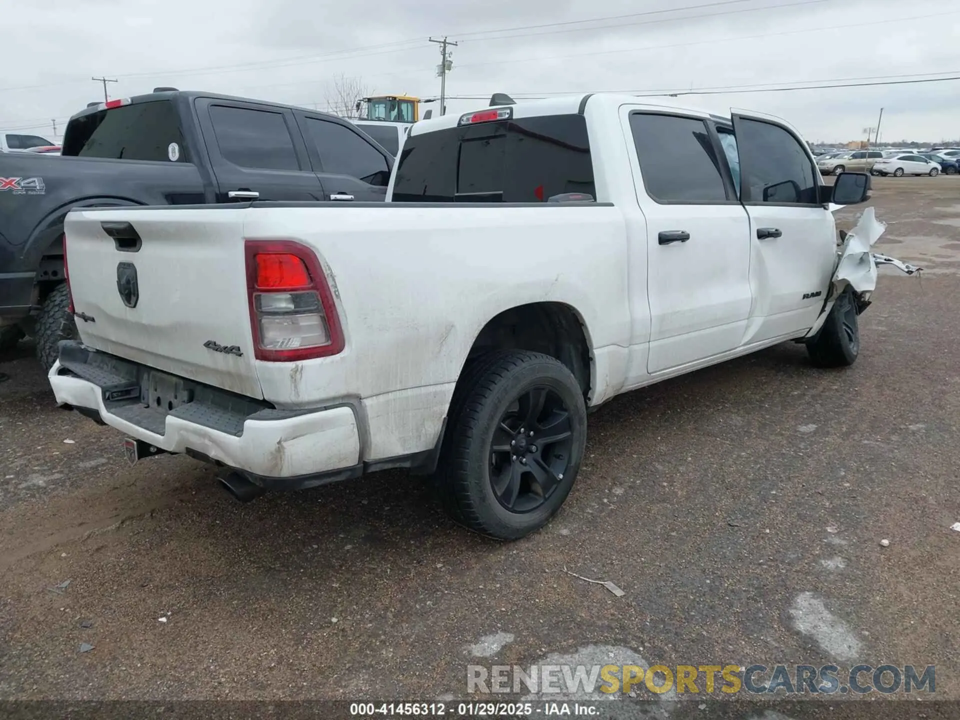 4 Photograph of a damaged car 1C6SRFFM3PN563513 RAM 1500 2023