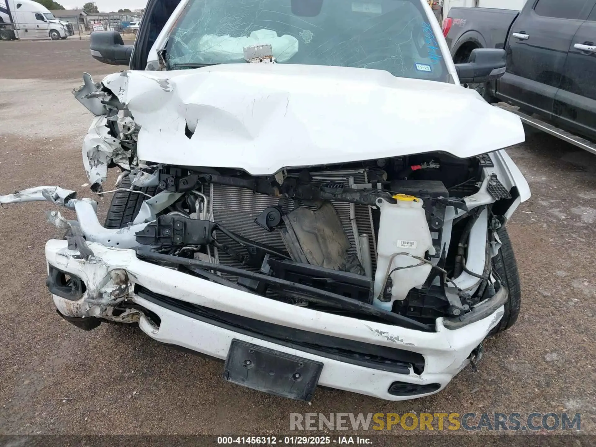 6 Photograph of a damaged car 1C6SRFFM3PN563513 RAM 1500 2023