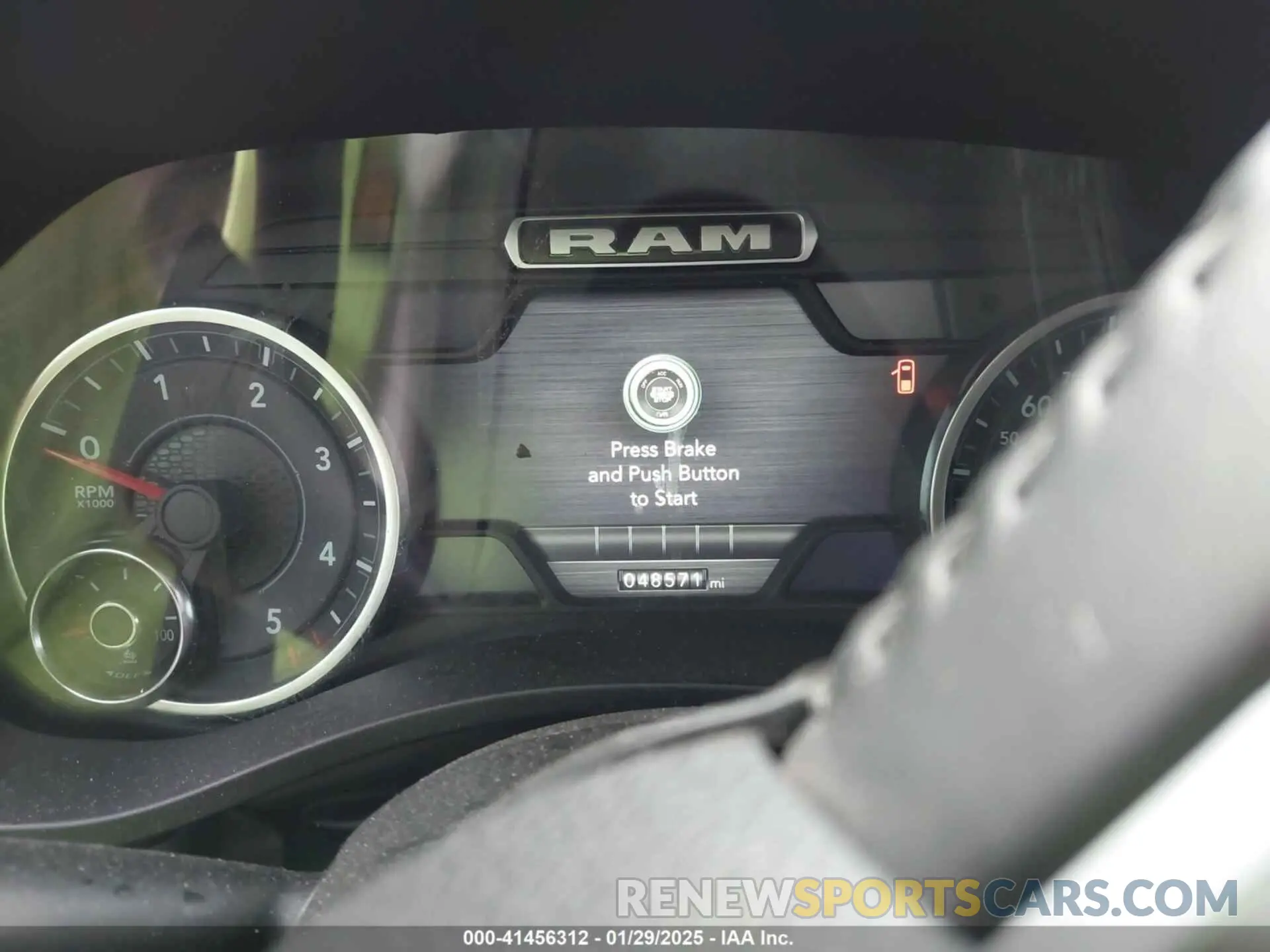 7 Photograph of a damaged car 1C6SRFFM3PN563513 RAM 1500 2023