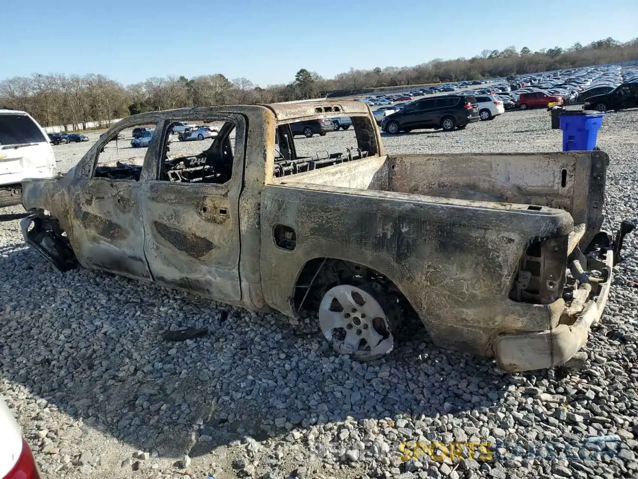 2 Photograph of a damaged car 1C6SRFFM8PN533939 RAM 1500 2023