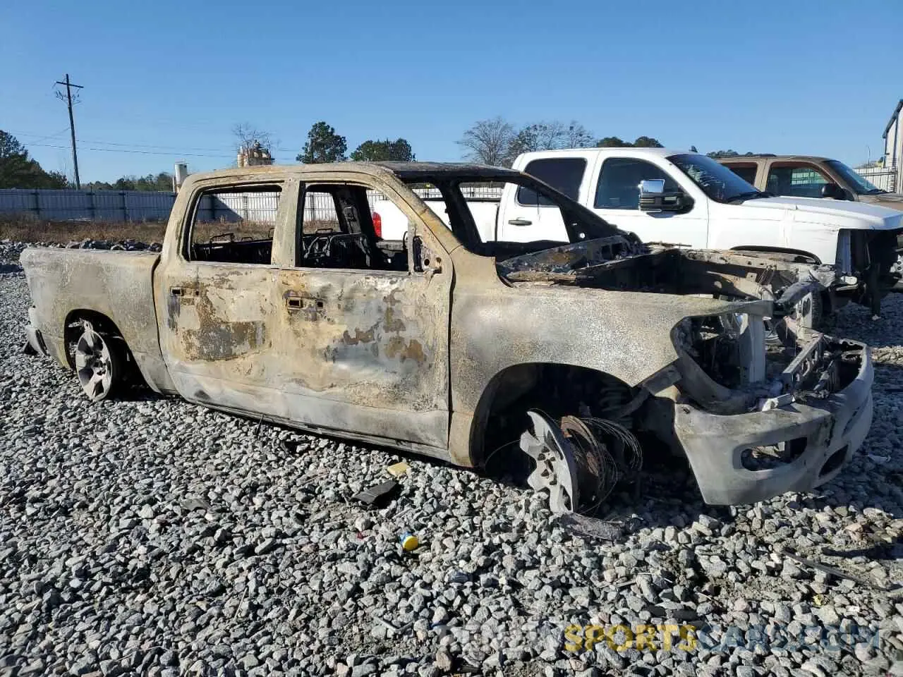 4 Photograph of a damaged car 1C6SRFFM8PN533939 RAM 1500 2023