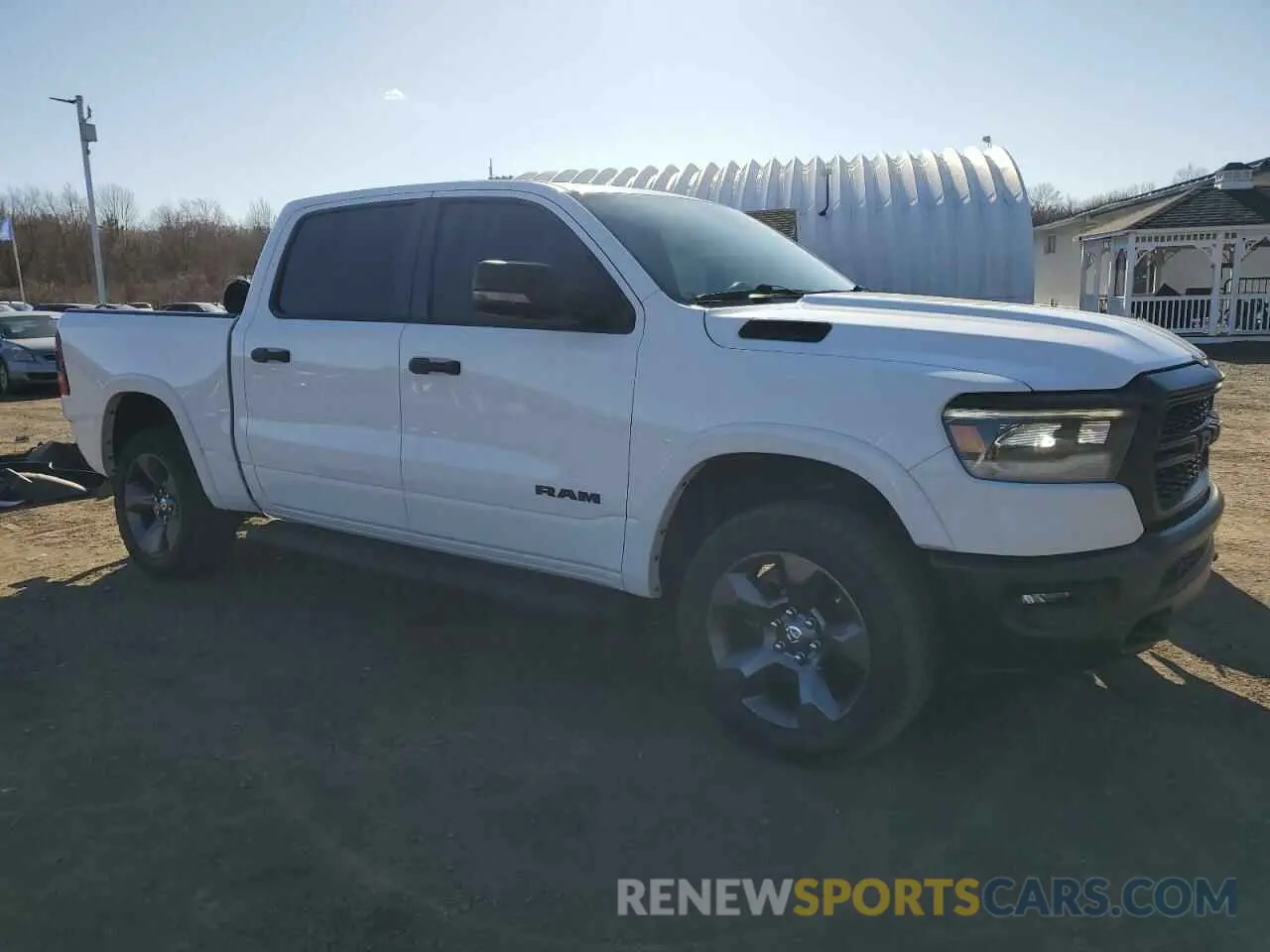 4 Photograph of a damaged car 1C6SRFFT0PN546773 RAM 1500 2023