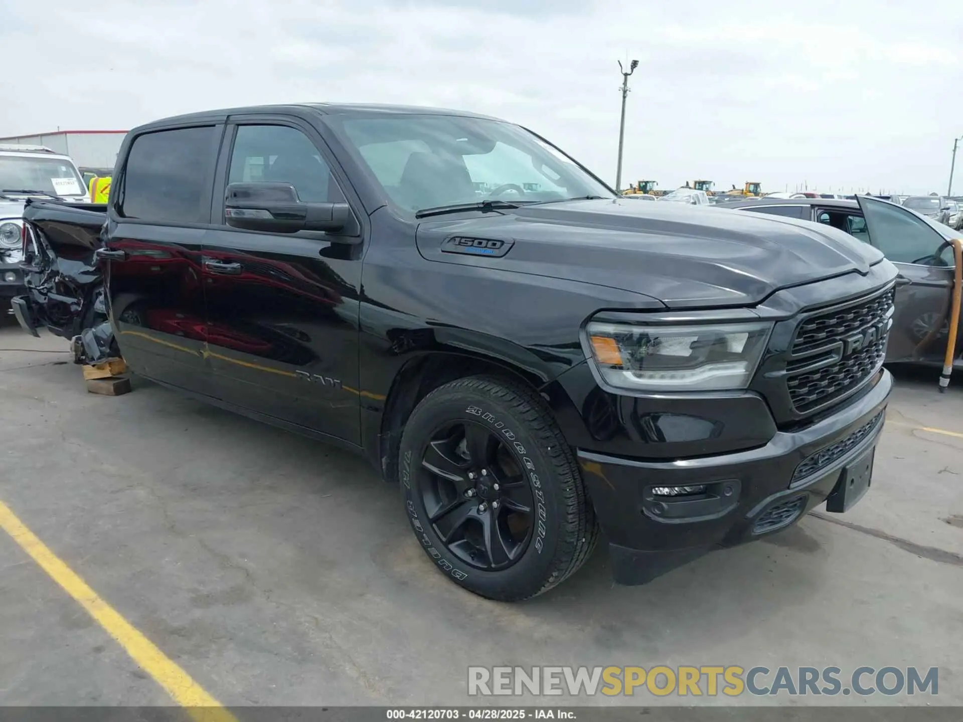 1 Photograph of a damaged car 1C6SRFFT0PN548524 RAM 1500 2023