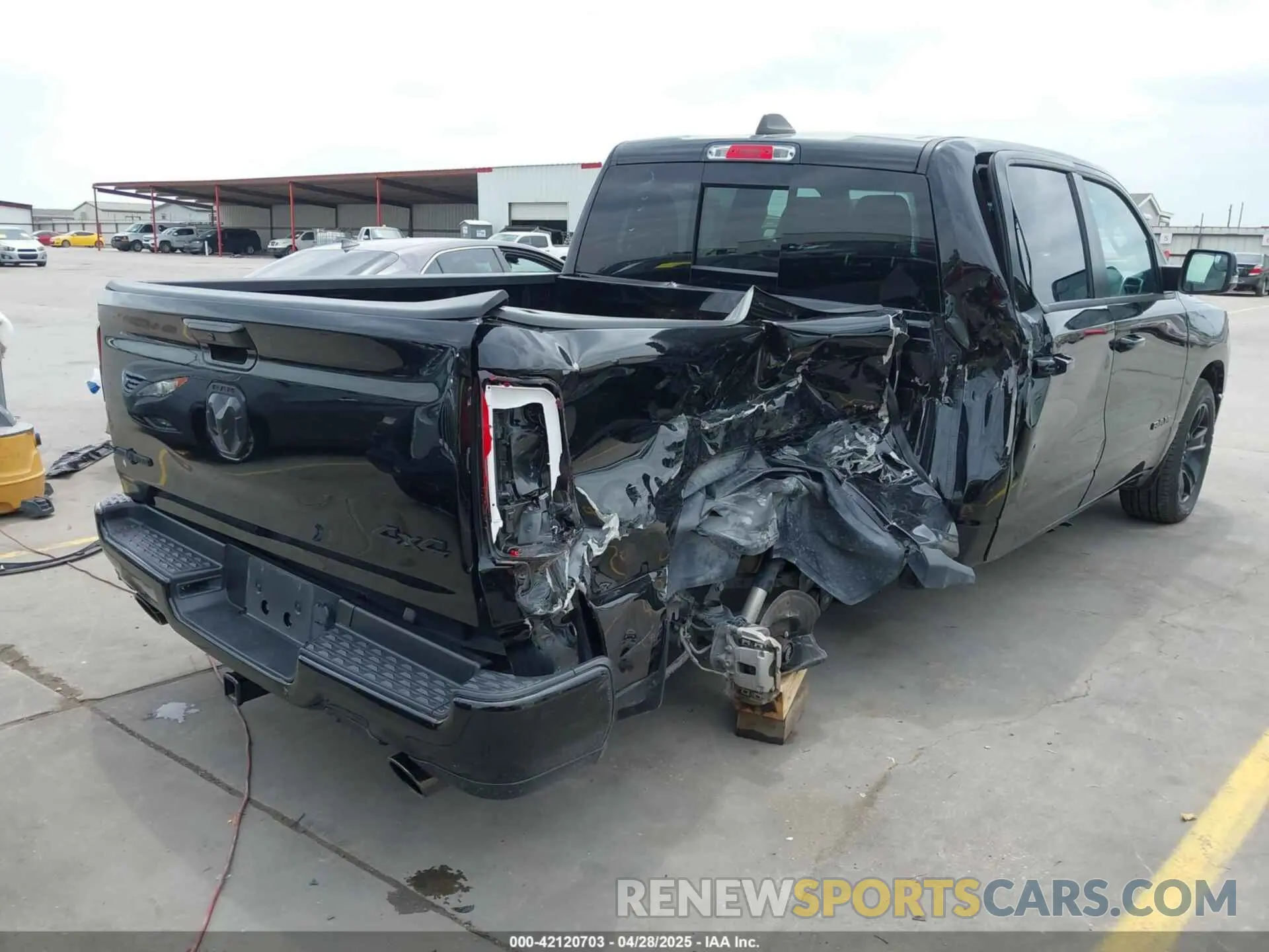 4 Photograph of a damaged car 1C6SRFFT0PN548524 RAM 1500 2023