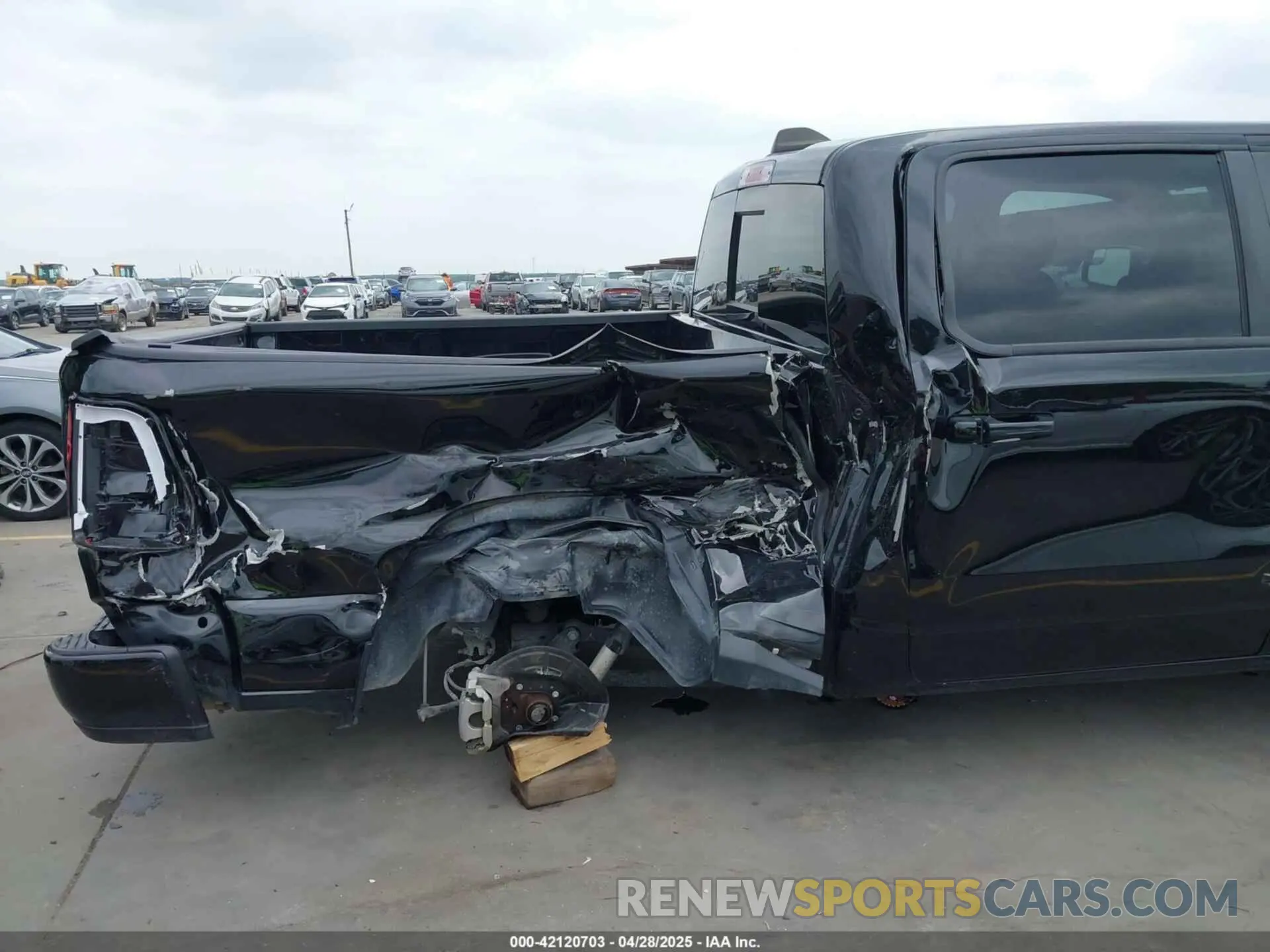 6 Photograph of a damaged car 1C6SRFFT0PN548524 RAM 1500 2023
