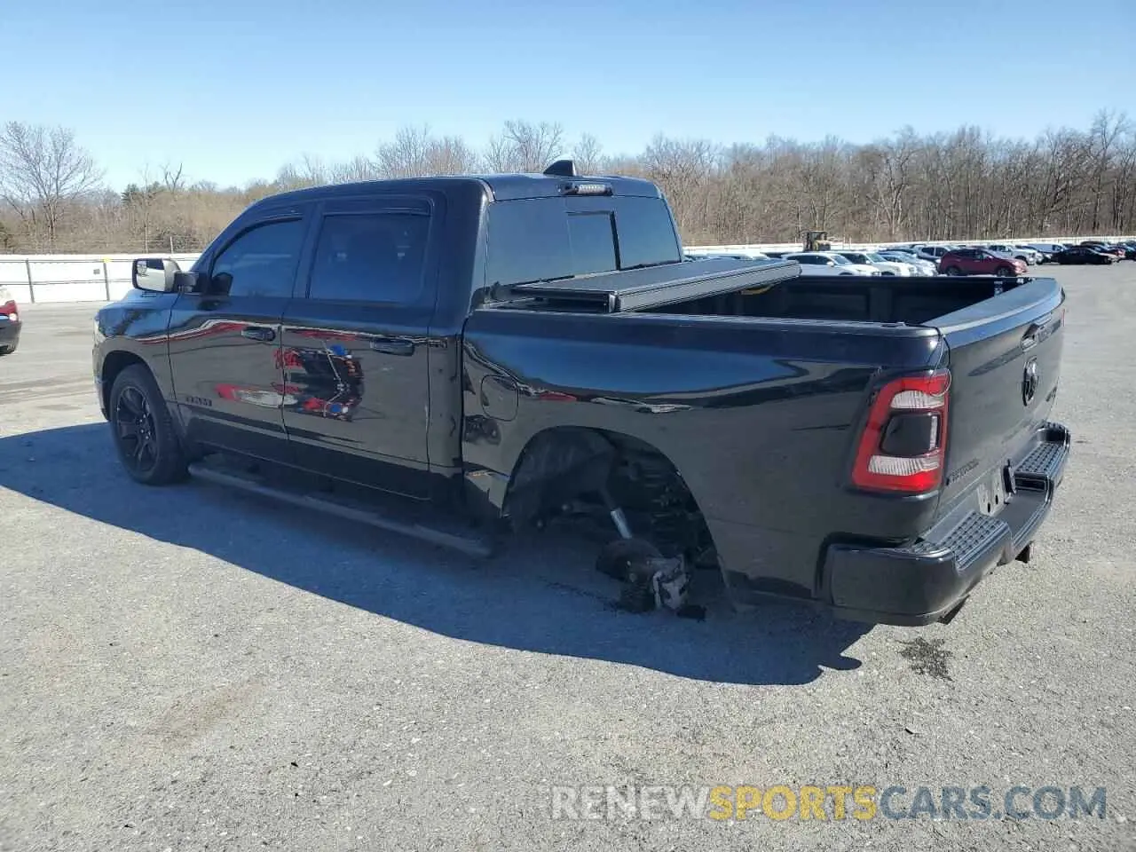 2 Photograph of a damaged car 1C6SRFFT0PN613131 RAM 1500 2023