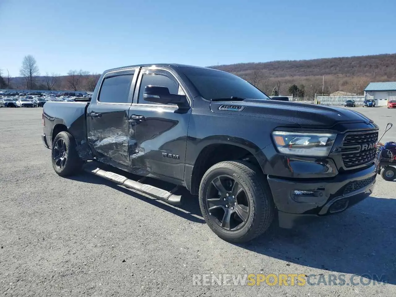 4 Photograph of a damaged car 1C6SRFFT0PN613131 RAM 1500 2023