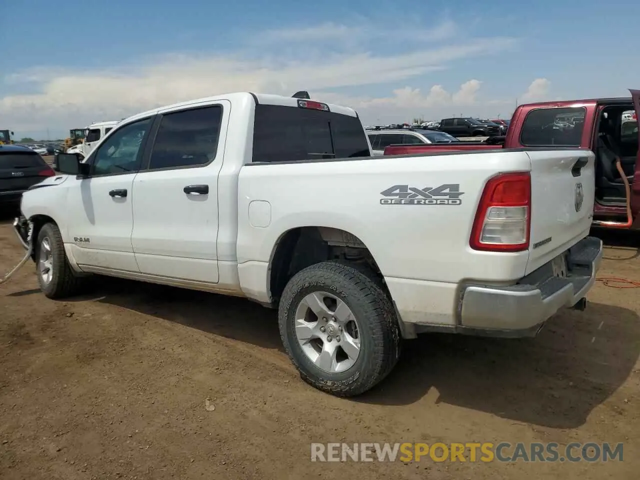 2 Photograph of a damaged car 1C6SRFFT0PN616465 RAM 1500 2023