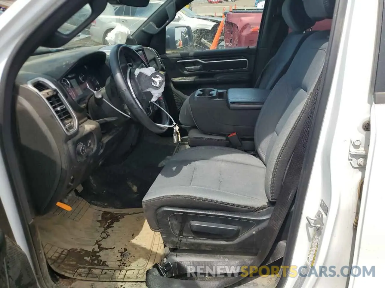 7 Photograph of a damaged car 1C6SRFFT0PN616465 RAM 1500 2023