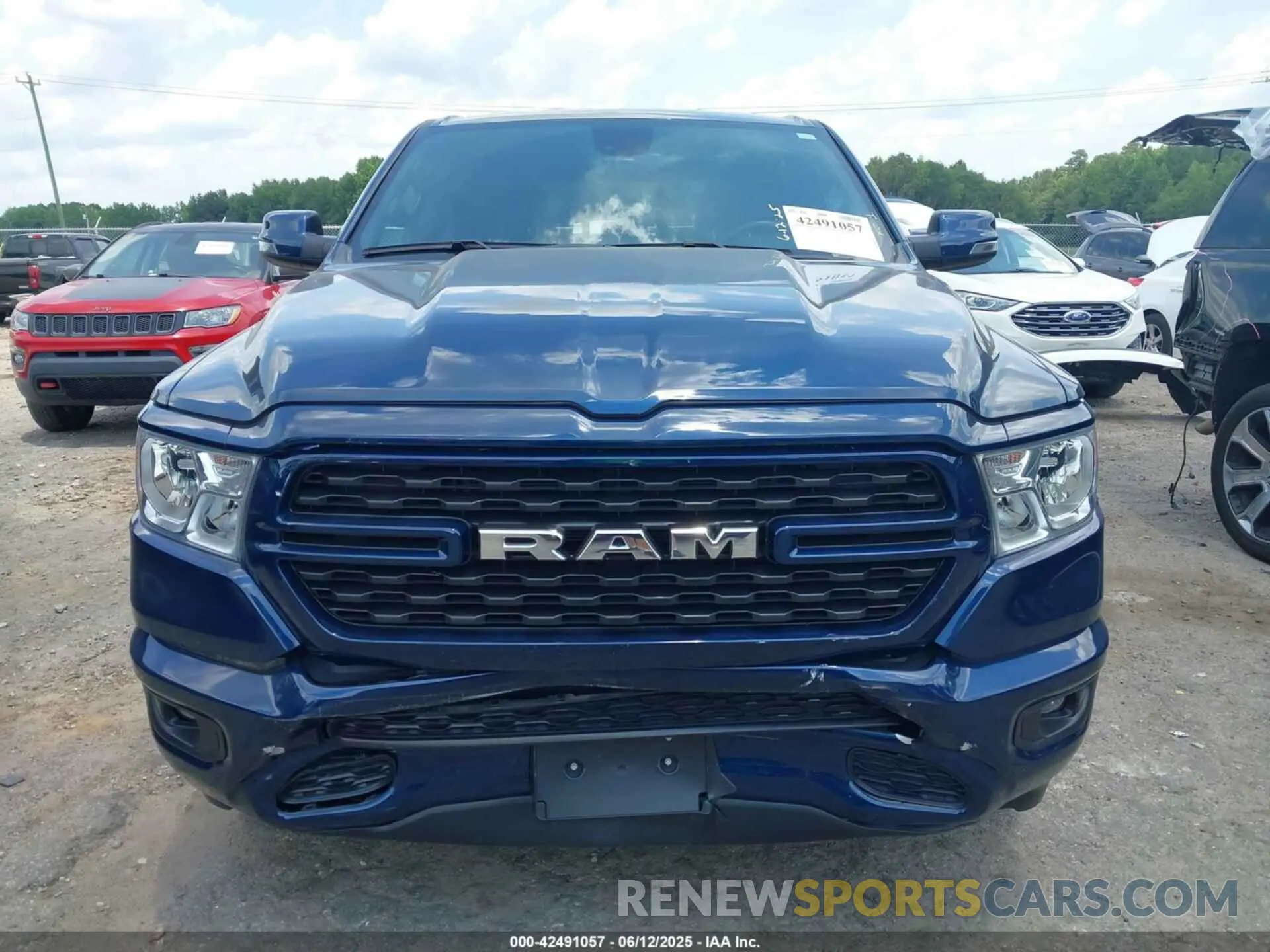 12 Photograph of a damaged car 1C6SRFFT0PN621987 RAM 1500 2023