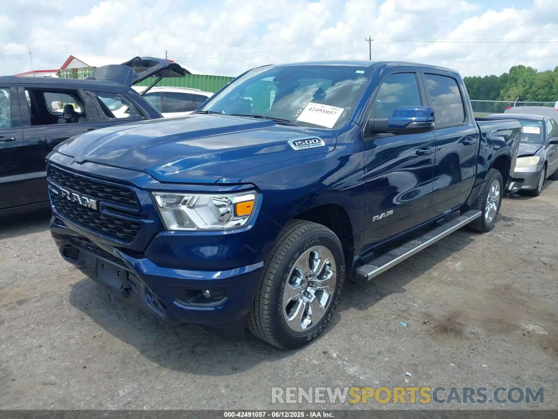 2 Photograph of a damaged car 1C6SRFFT0PN621987 RAM 1500 2023