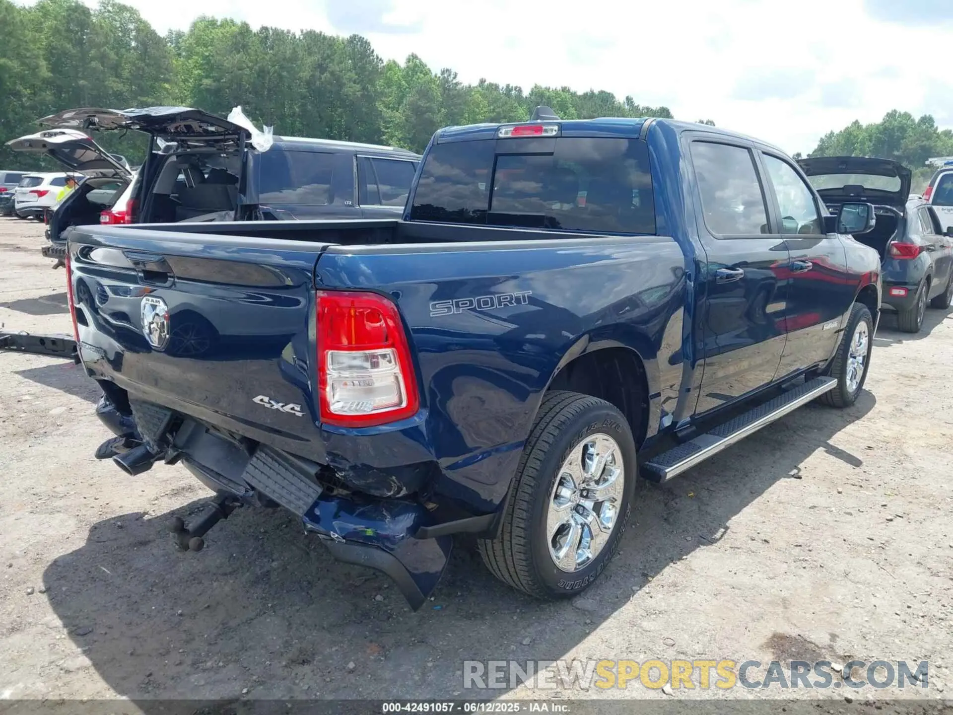 4 Photograph of a damaged car 1C6SRFFT0PN621987 RAM 1500 2023