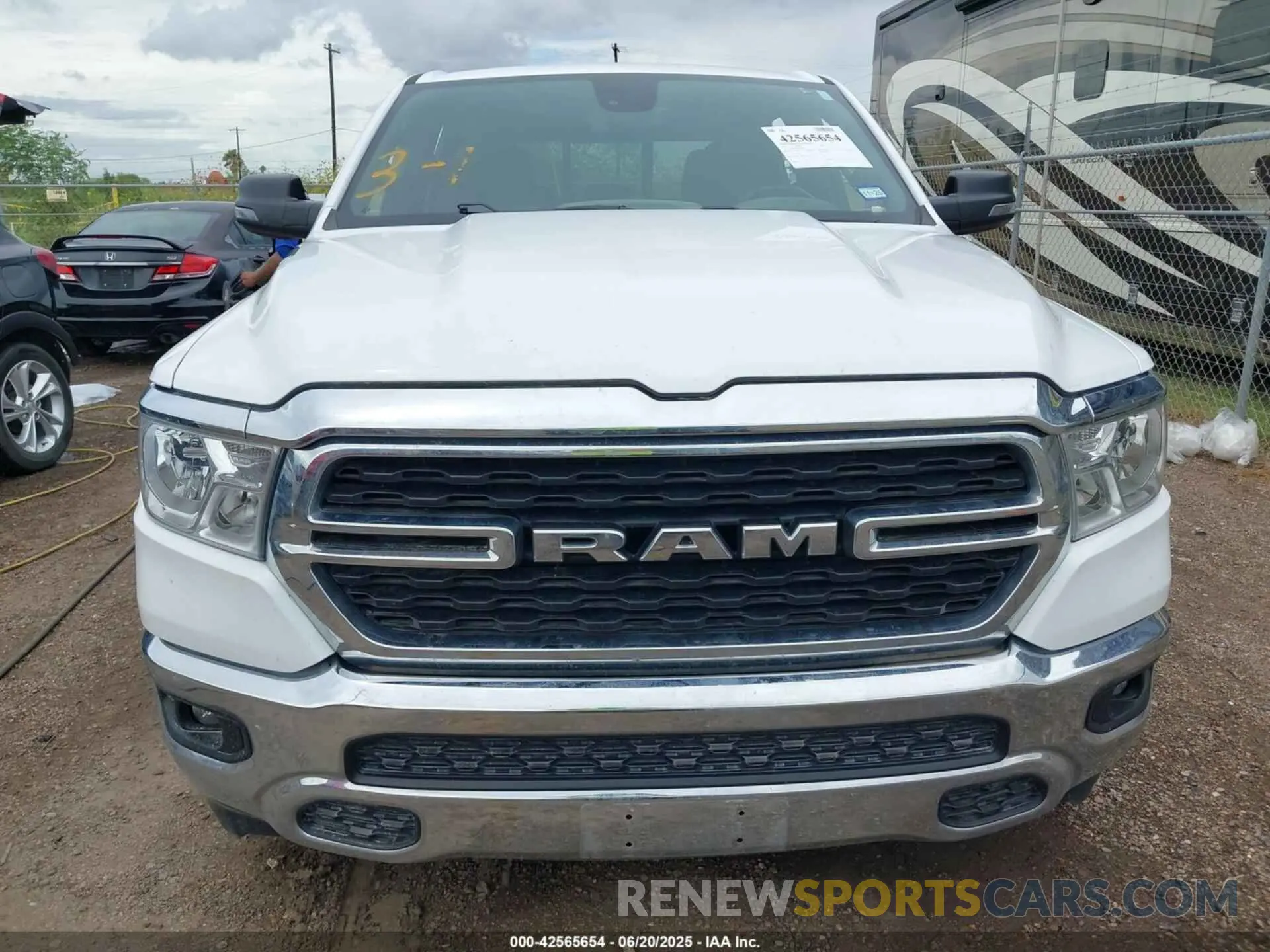 11 Photograph of a damaged car 1C6SRFFT0PN702987 RAM 1500 2023