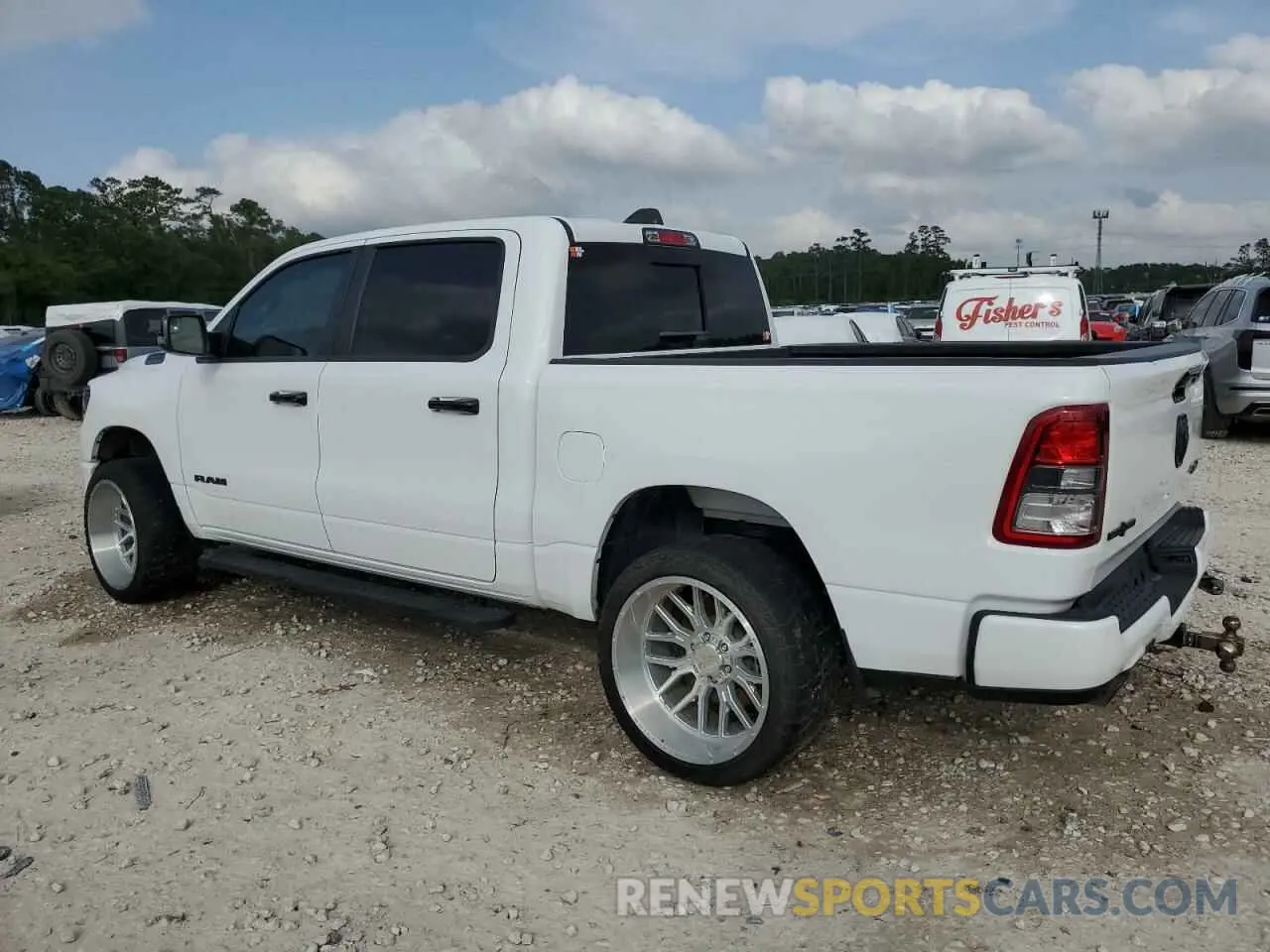 2 Photograph of a damaged car 1C6SRFFT1PN605393 RAM 1500 2023