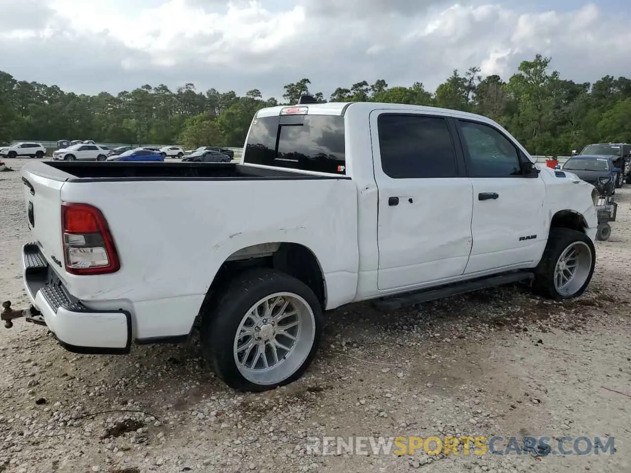 3 Photograph of a damaged car 1C6SRFFT1PN605393 RAM 1500 2023