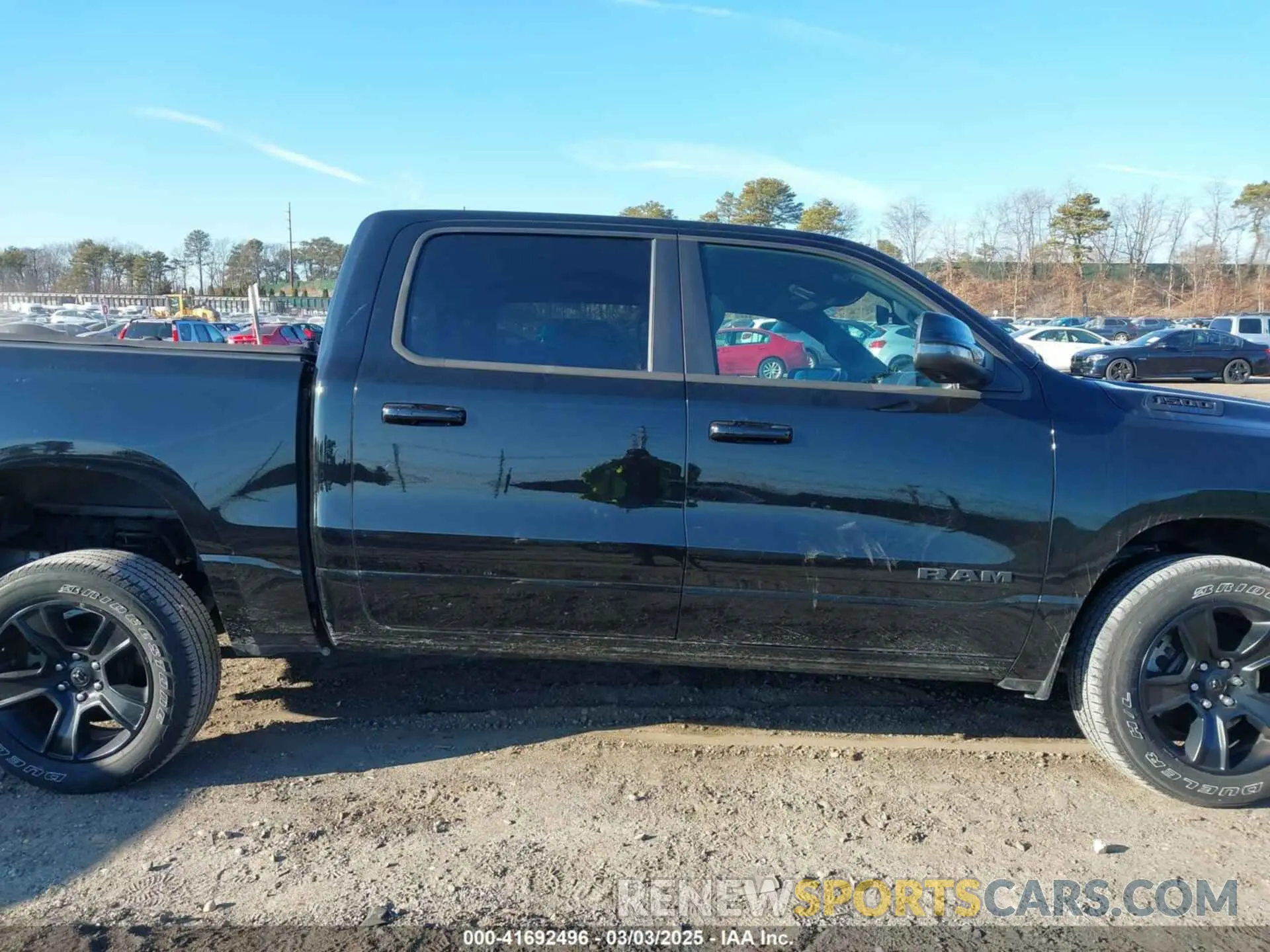 14 Photograph of a damaged car 1C6SRFFT1PN660751 RAM 1500 2023