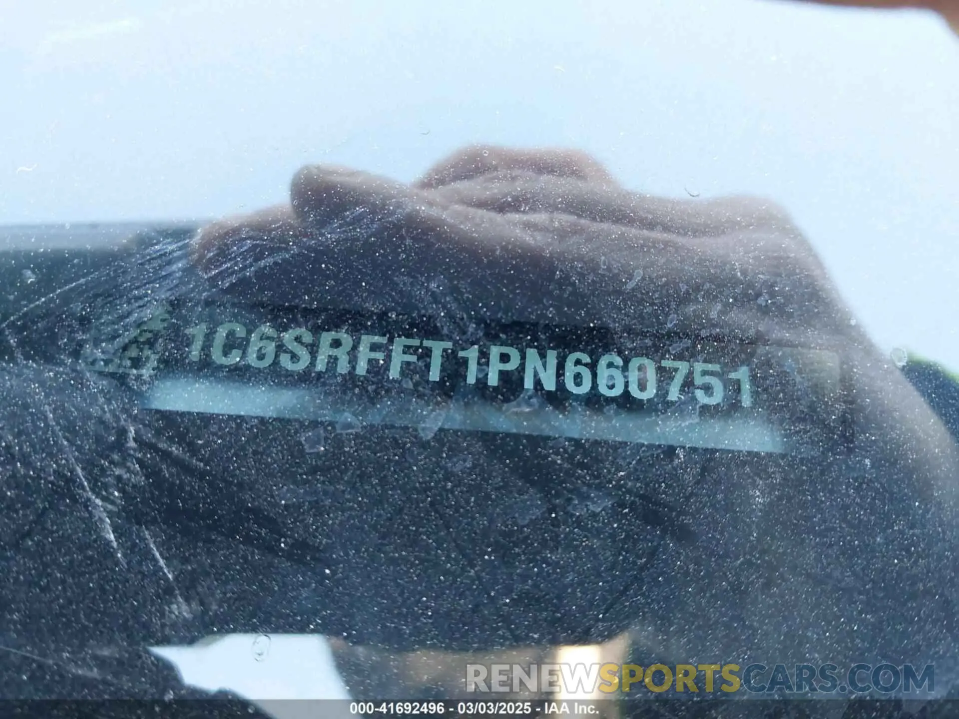 18 Photograph of a damaged car 1C6SRFFT1PN660751 RAM 1500 2023