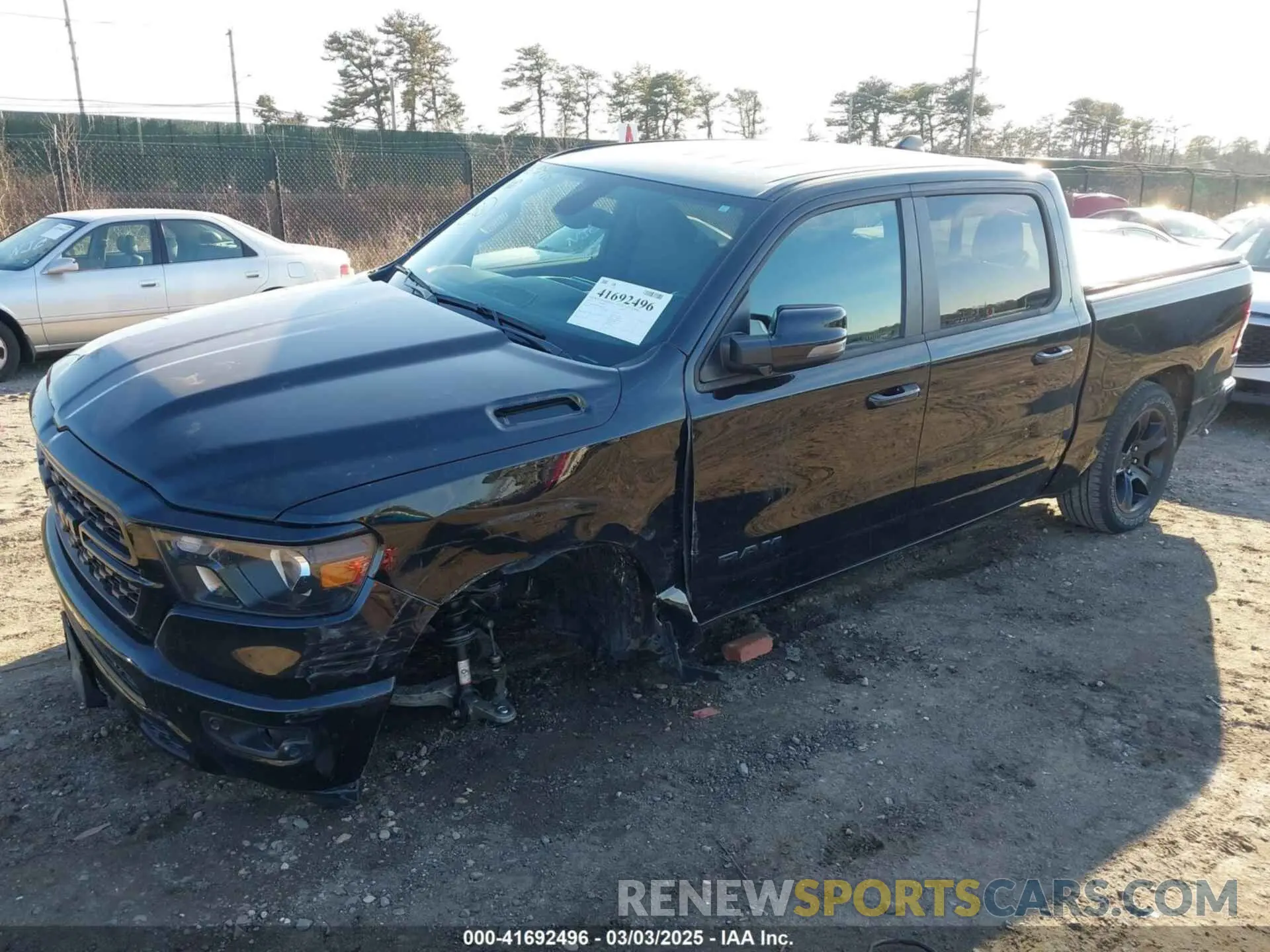 2 Photograph of a damaged car 1C6SRFFT1PN660751 RAM 1500 2023