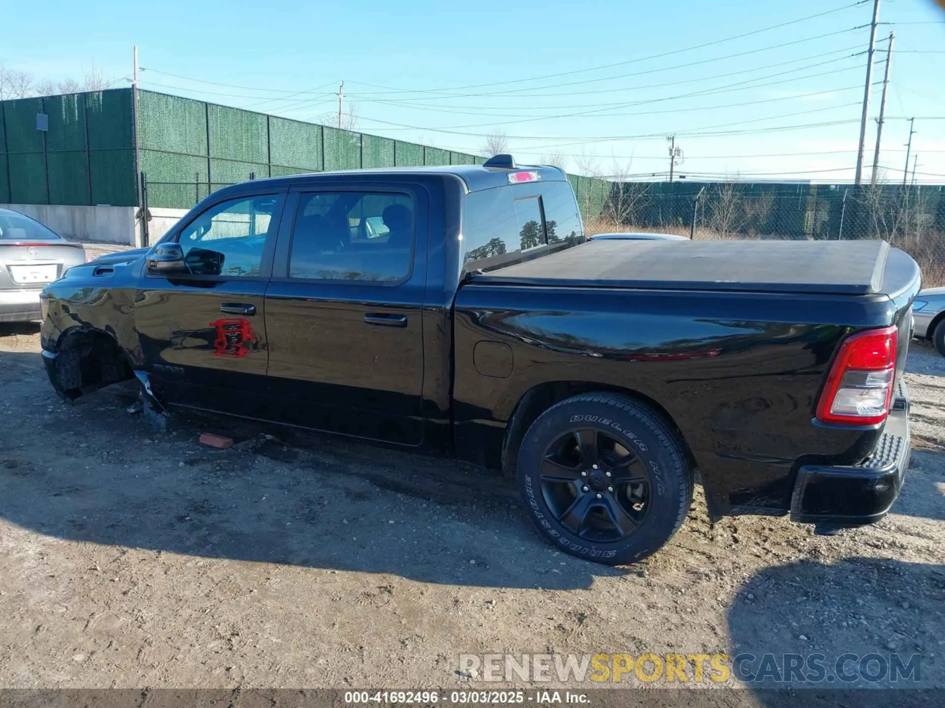 3 Photograph of a damaged car 1C6SRFFT1PN660751 RAM 1500 2023