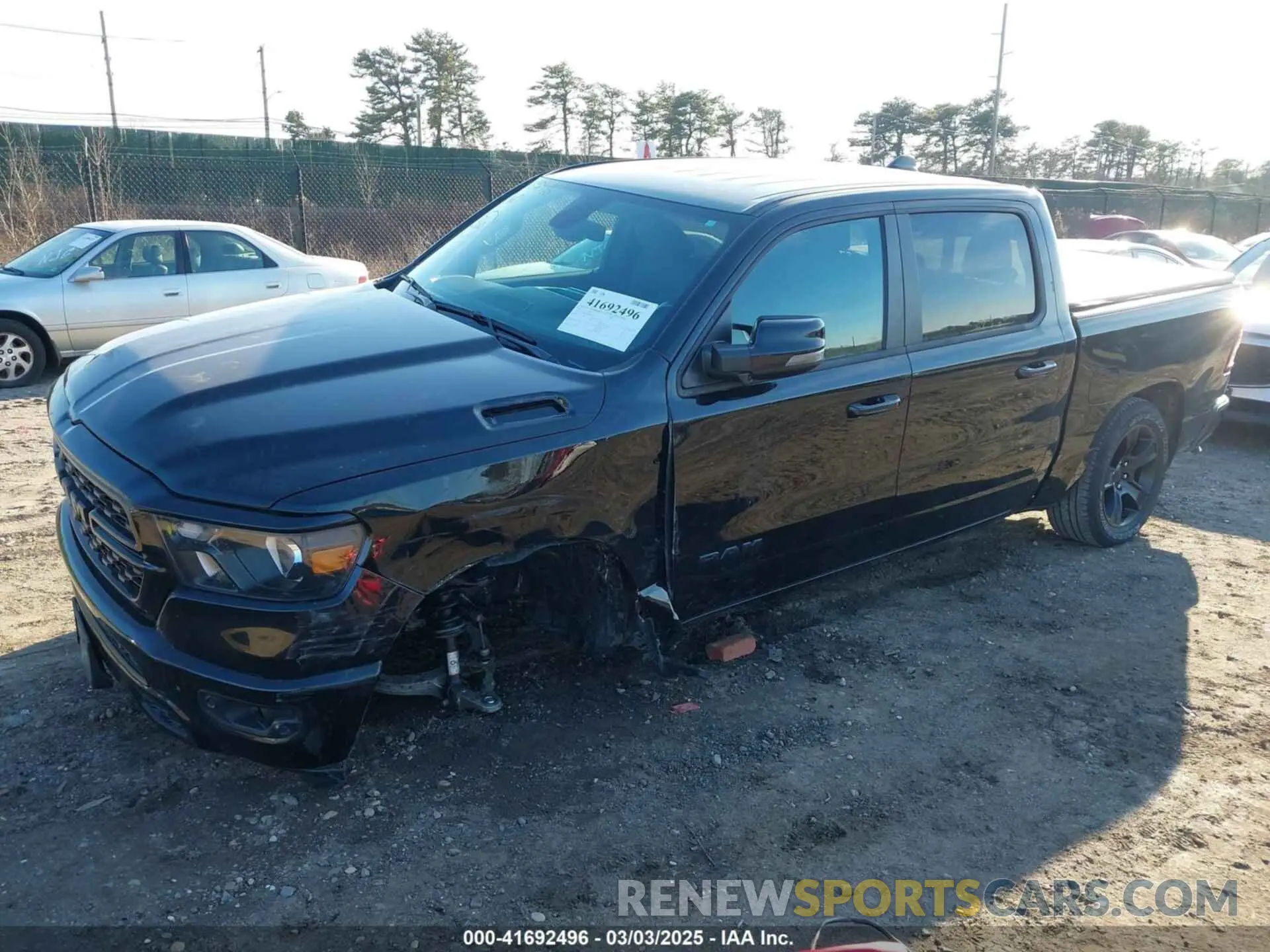 6 Photograph of a damaged car 1C6SRFFT1PN660751 RAM 1500 2023