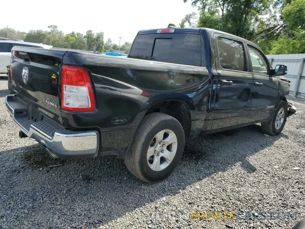 3 Photograph of a damaged car 1C6SRFFT2PN541011 RAM 1500 2023