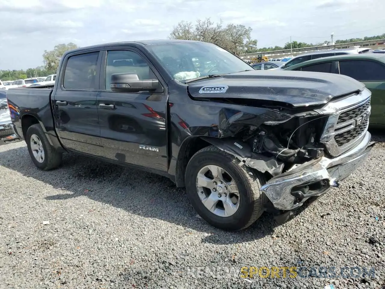 4 Photograph of a damaged car 1C6SRFFT2PN541011 RAM 1500 2023