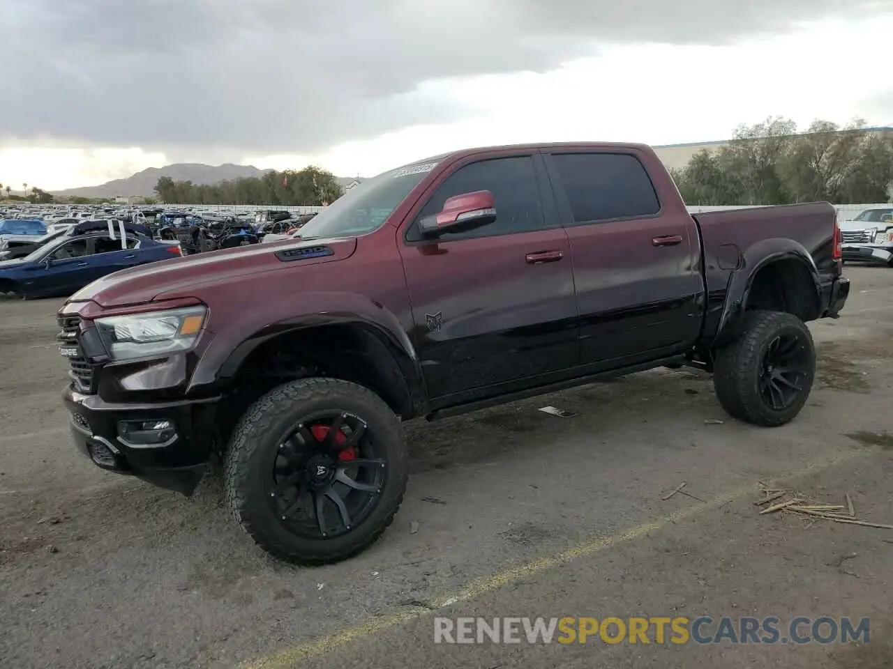 1 Photograph of a damaged car 1C6SRFFT2PN549979 RAM 1500 2023