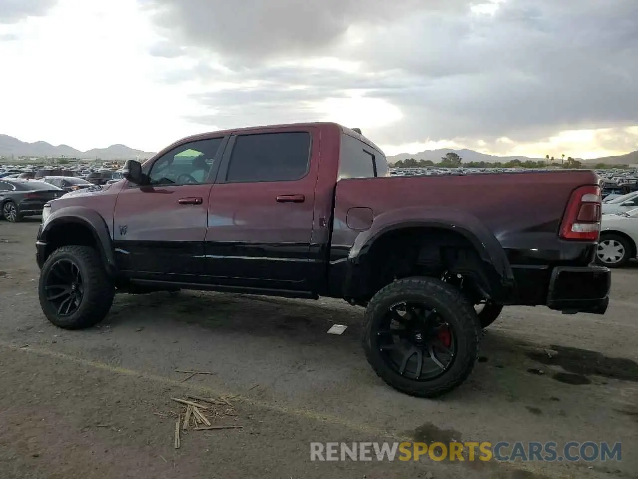 2 Photograph of a damaged car 1C6SRFFT2PN549979 RAM 1500 2023