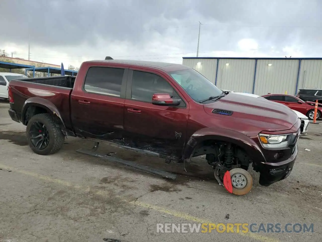 4 Photograph of a damaged car 1C6SRFFT2PN549979 RAM 1500 2023