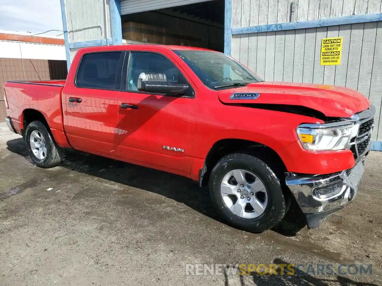 4 Photograph of a damaged car 1C6SRFFT2PN574235 RAM 1500 2023