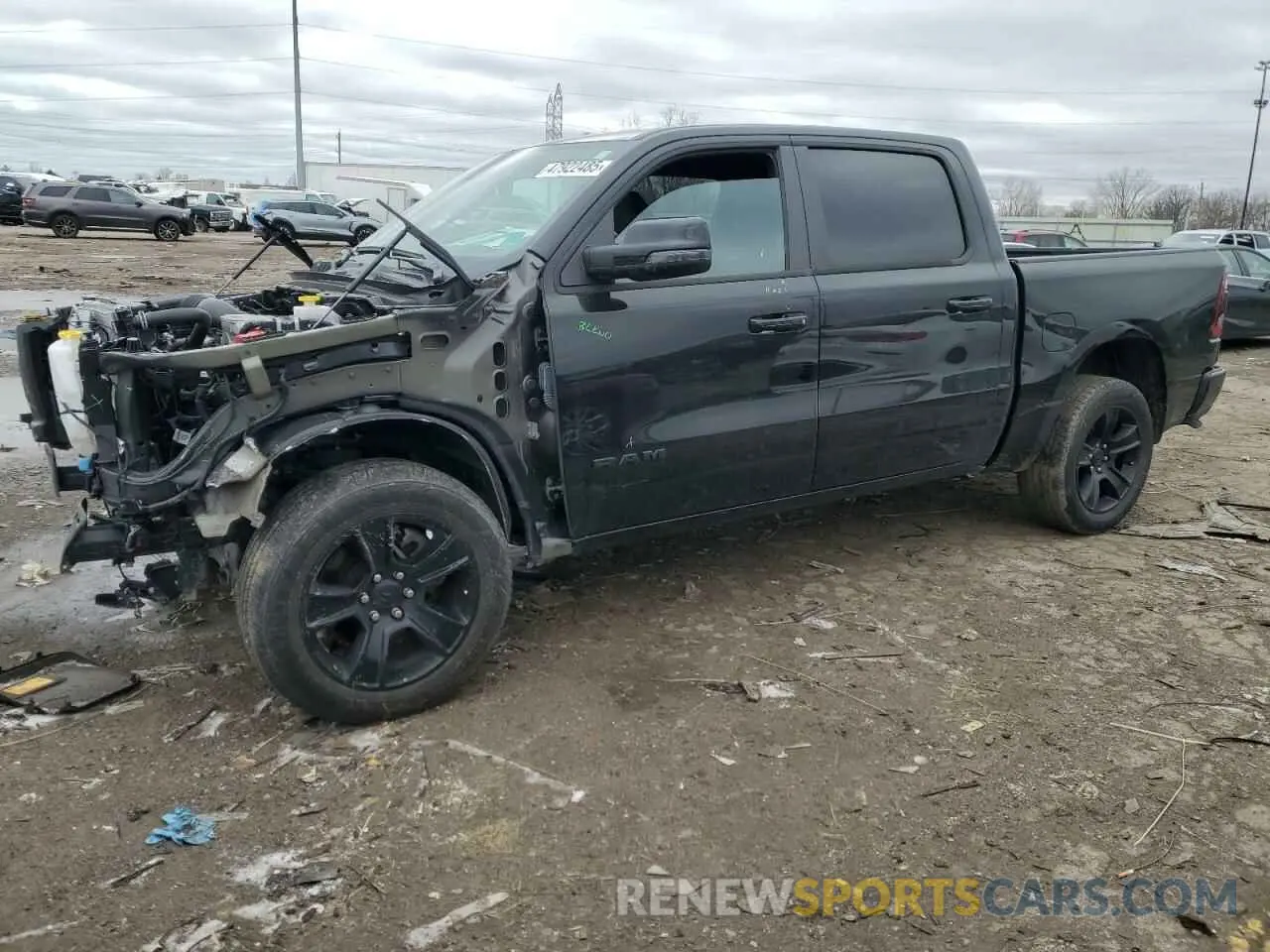 1 Photograph of a damaged car 1C6SRFFT2PN685089 RAM 1500 2023